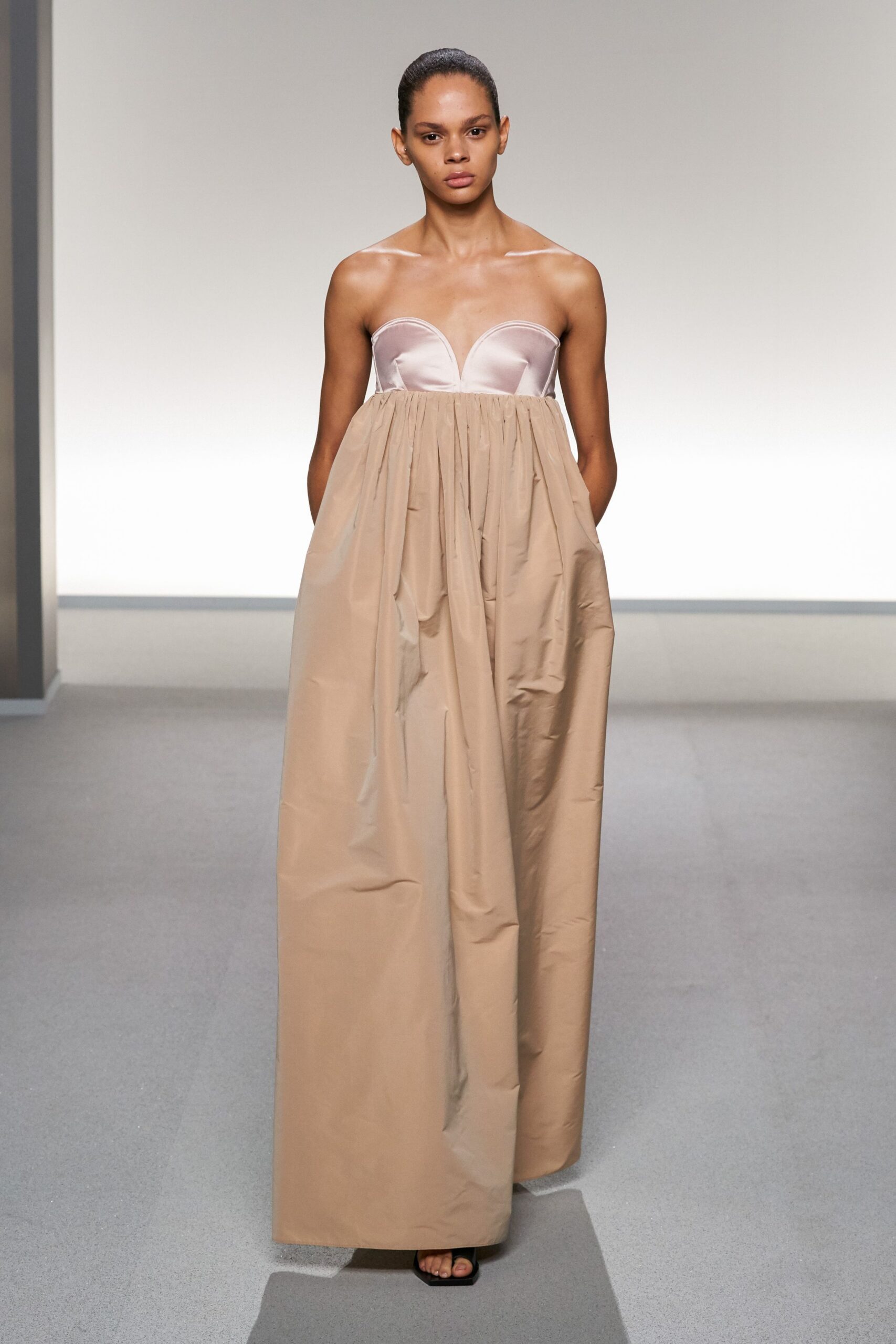 beige silk strapless fitted pleated maxi gown