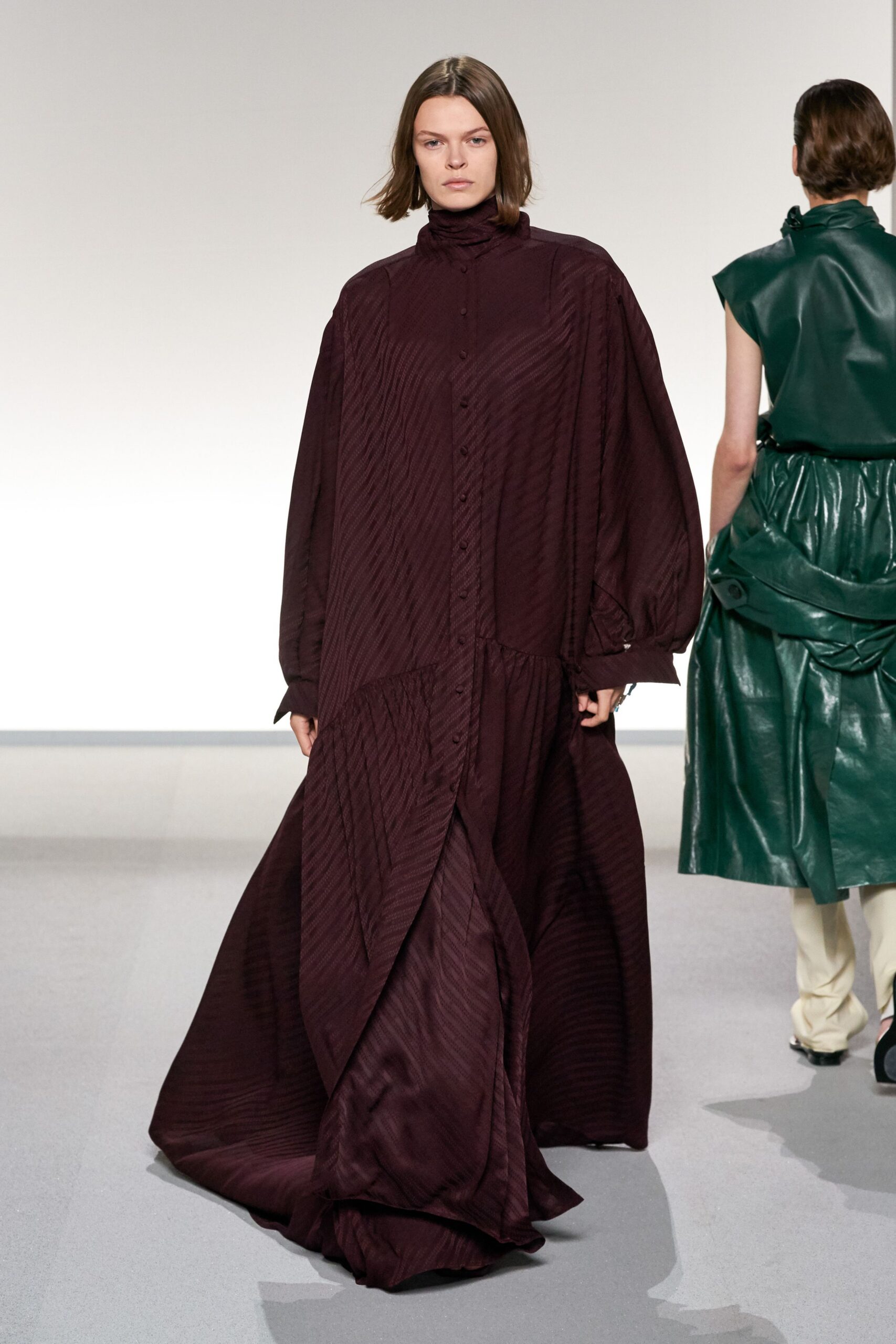 maroon silk long-sleeve high-neck relaxed pleated buttoned gown