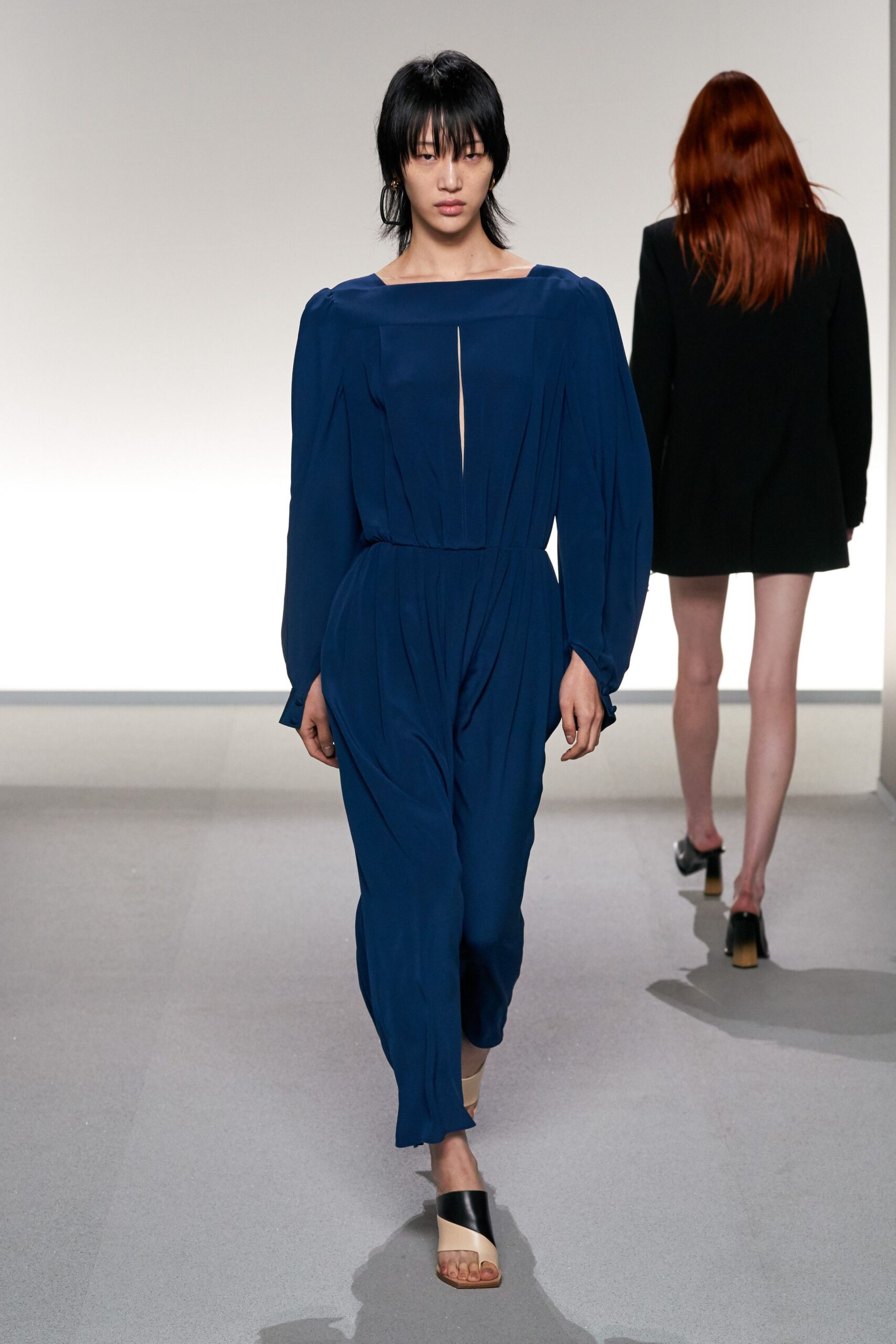 blue silk long-sleeve v-neck relaxed pleated flowing jumpsuit