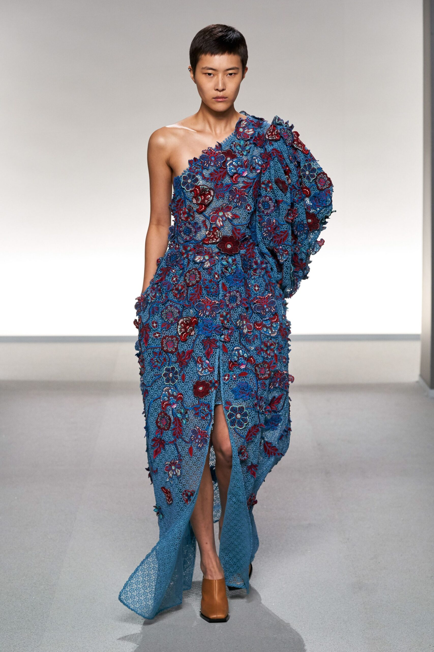 blue silk sleeveless off-shoulder fitted embroidered flared gown