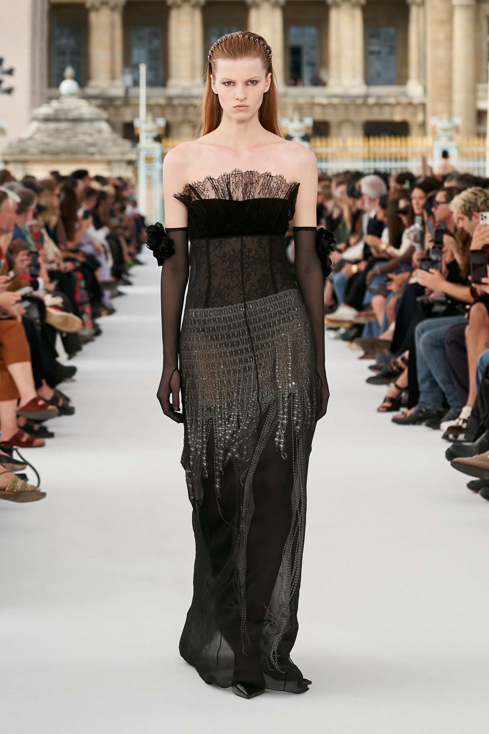 black silk strapless long-sleeve fitted pleated embellished gown