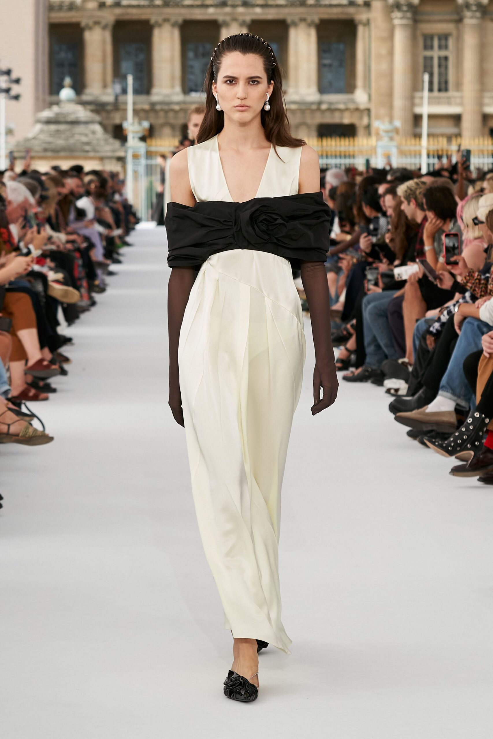 white silk sleeveless v-neck fitted draped layered gown