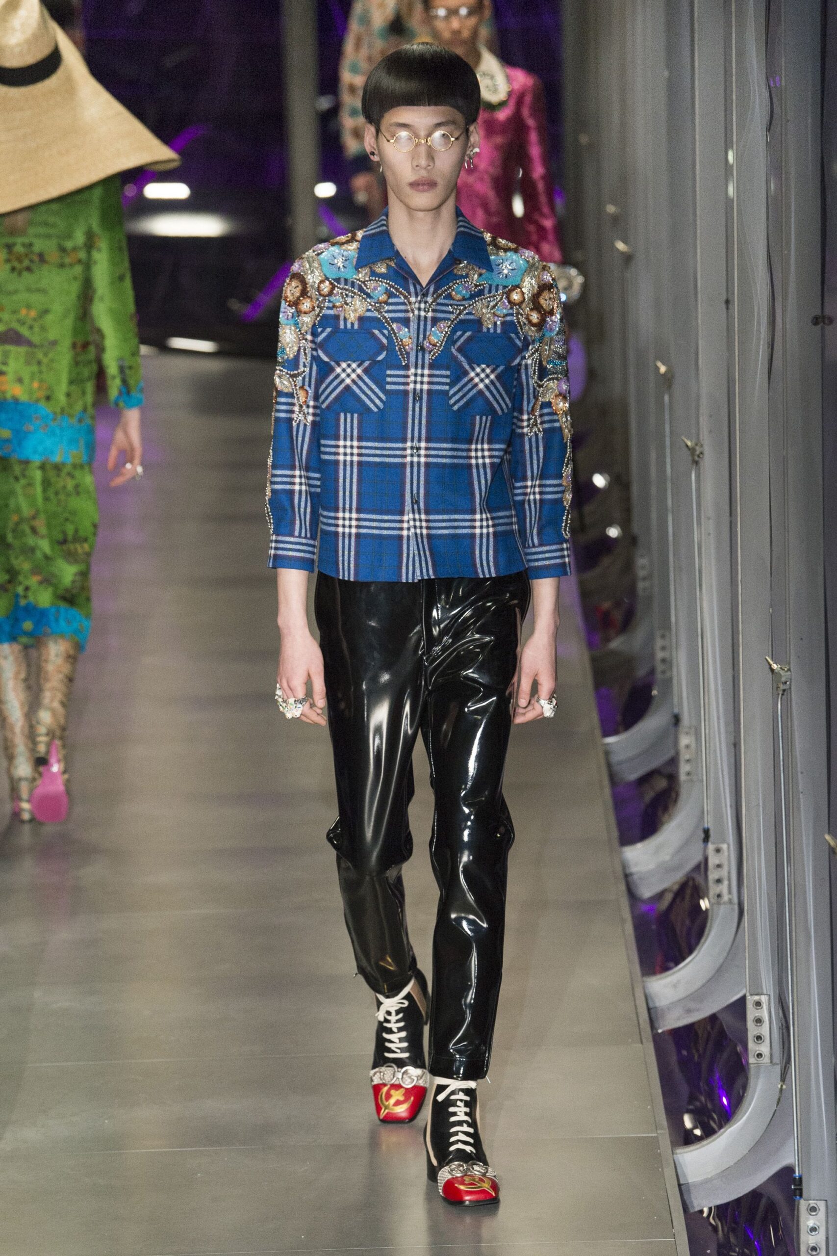 blue checked shirt with black pants