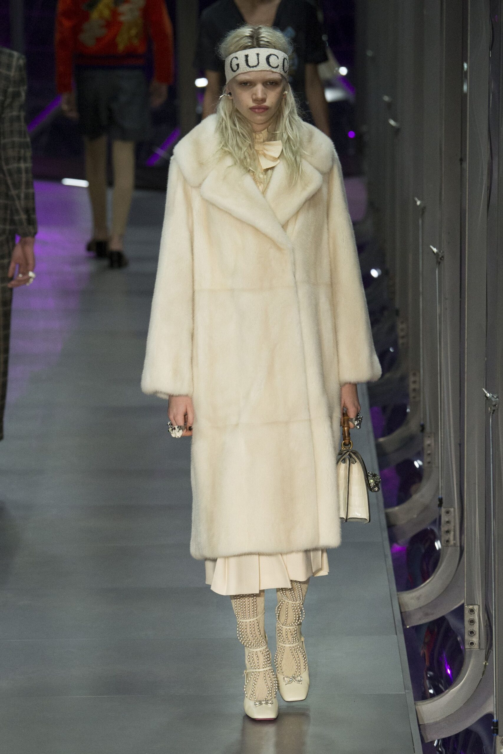 white fur coat and dress
