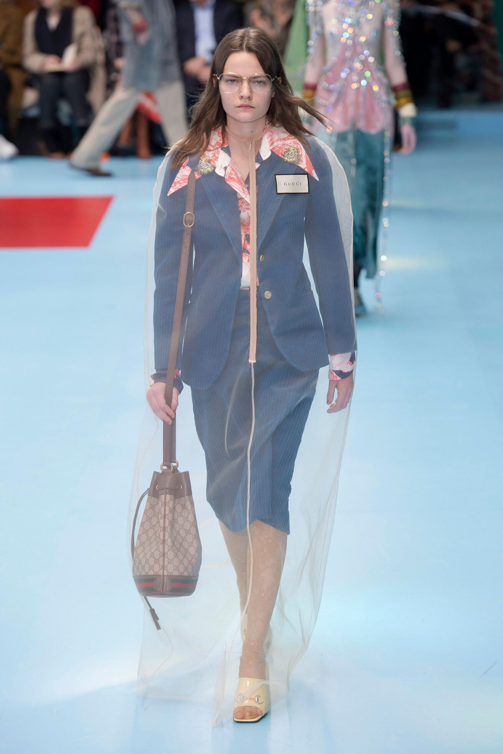 blue tailored blazer with clear cape