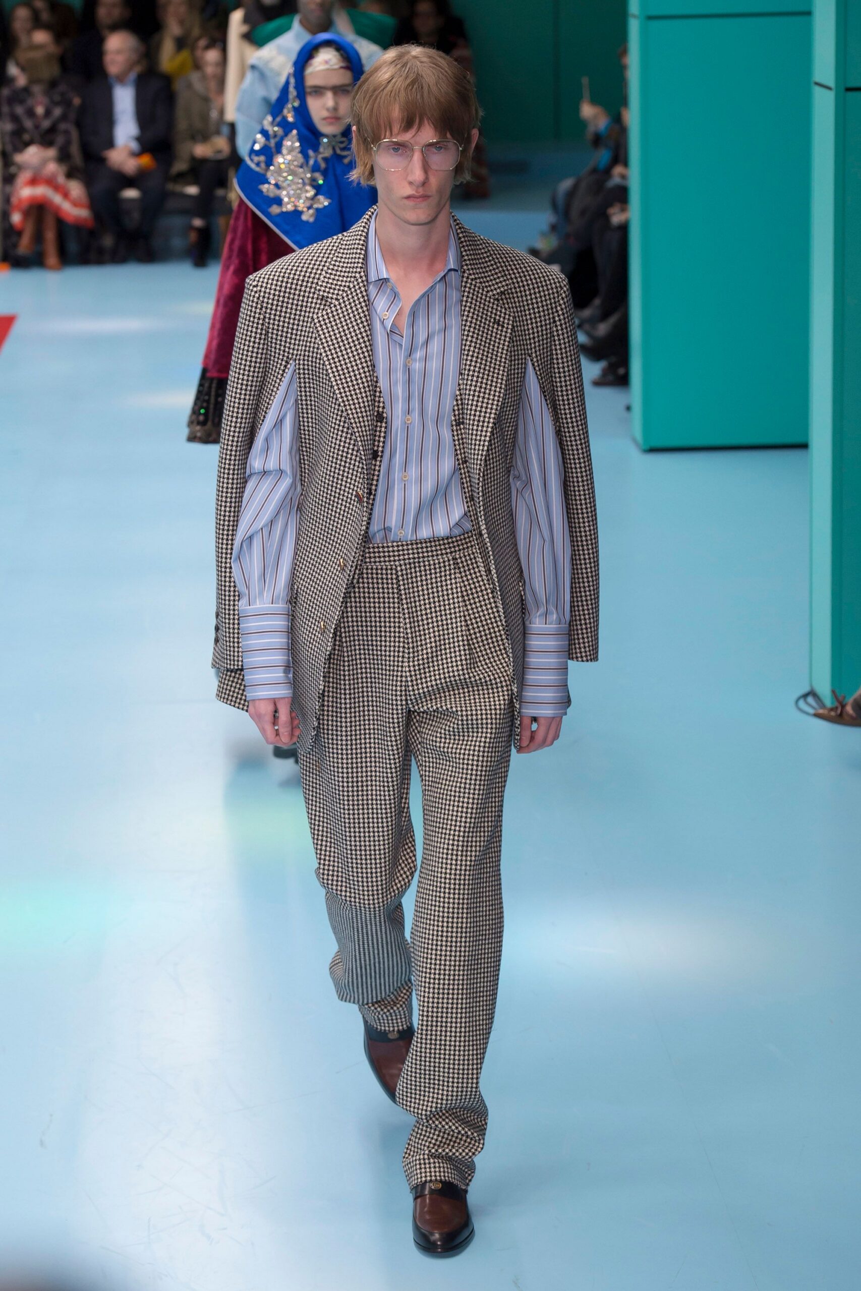 brown and white tailored suit
