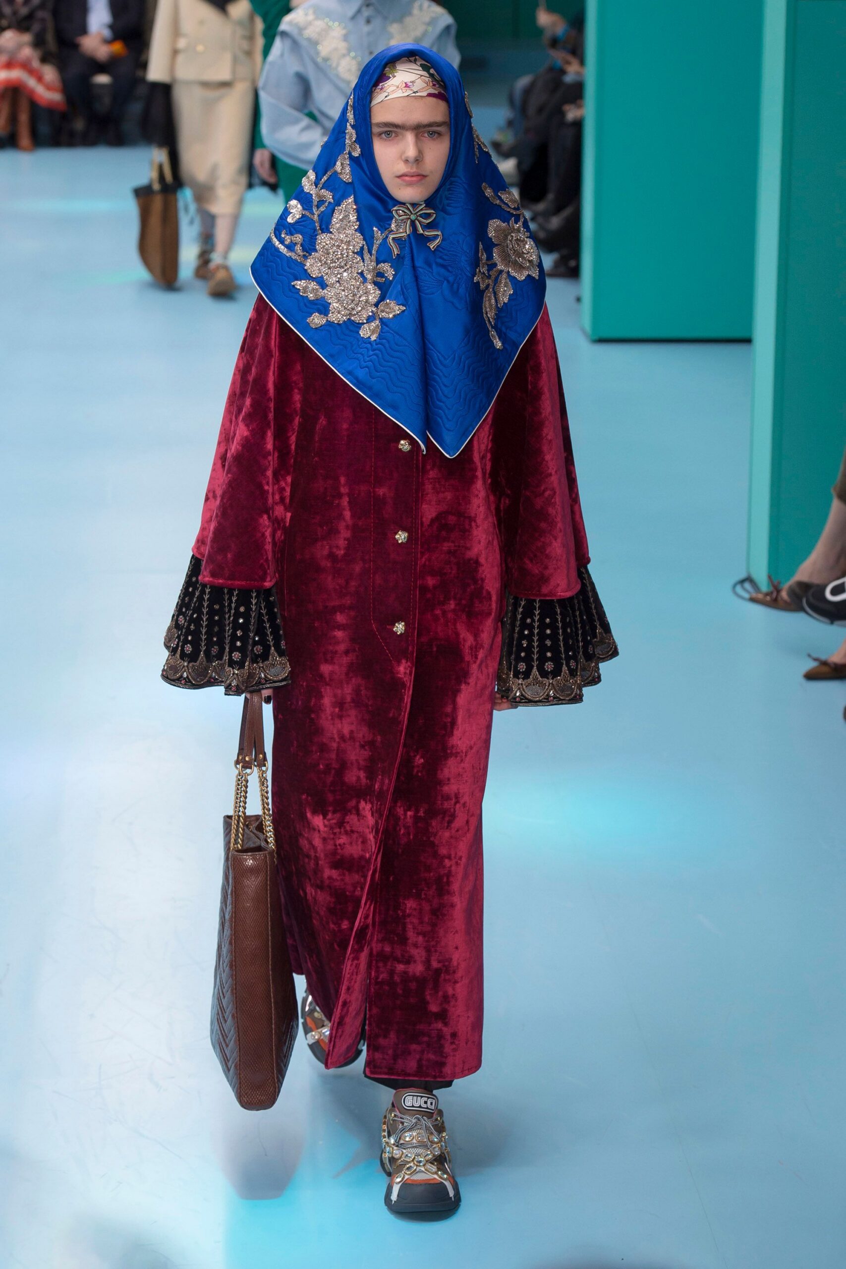 red velvet coat with blue scarf
