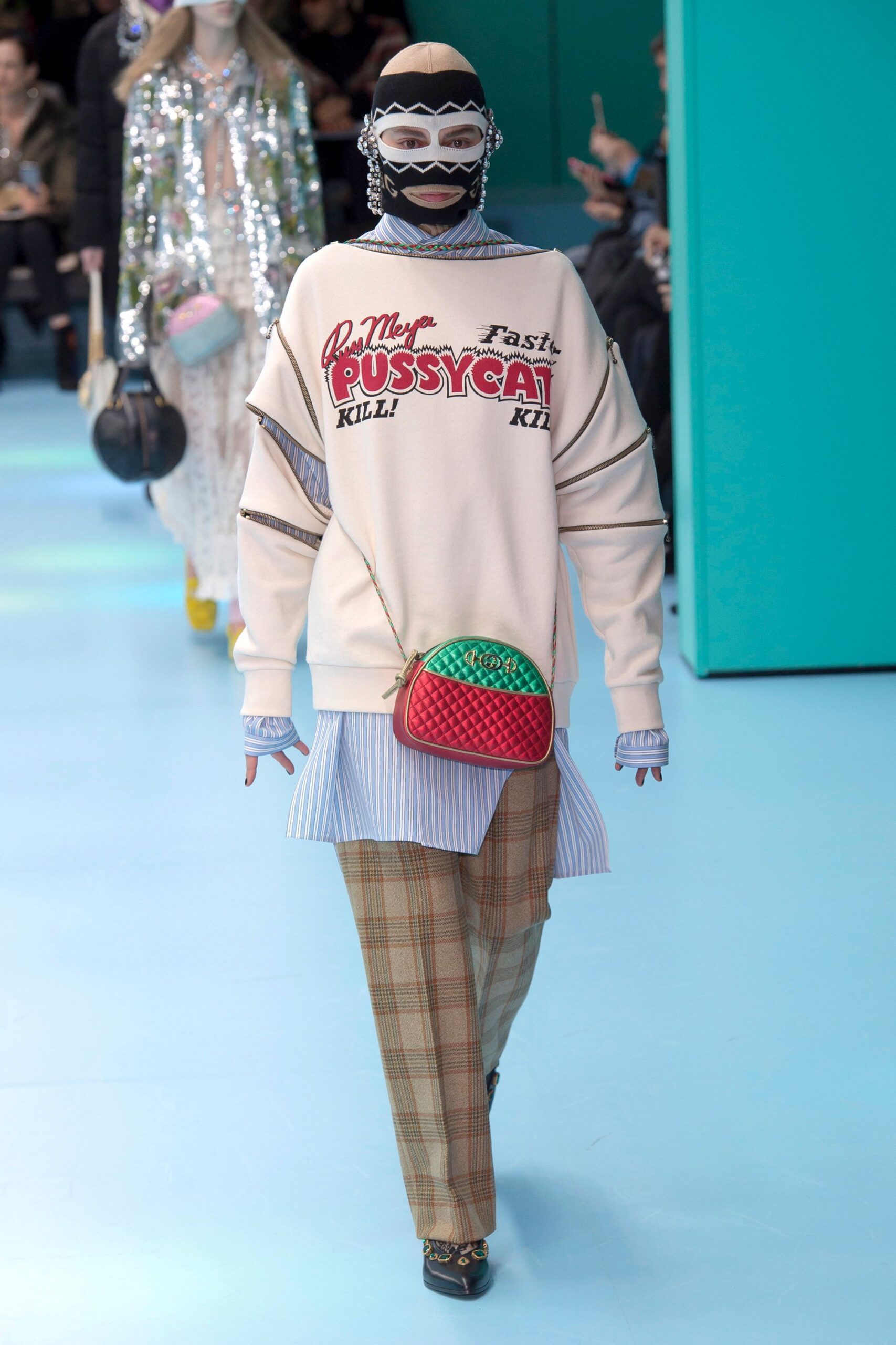 oversized beige sweater with checked pants