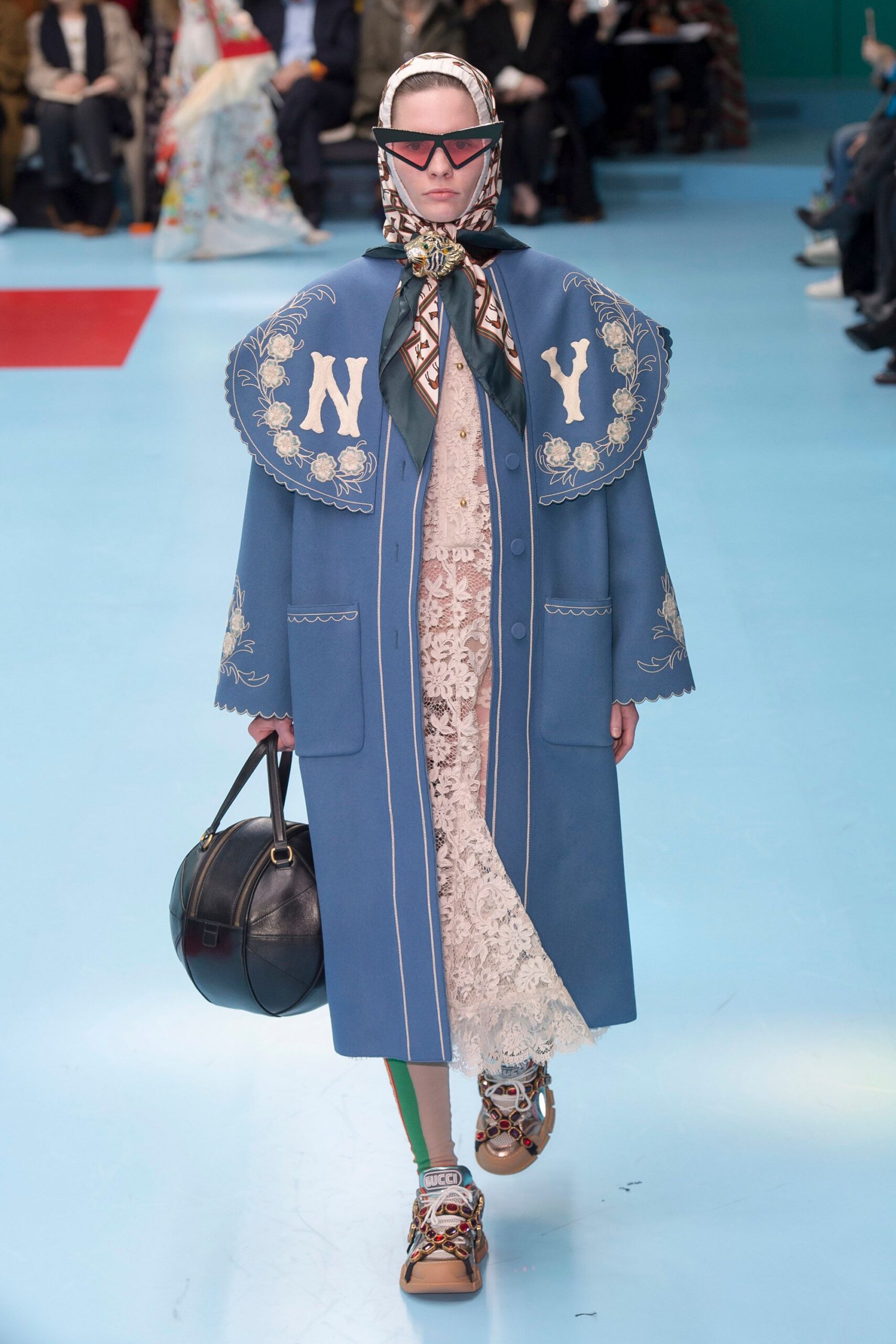 blue wool coat with lace dress