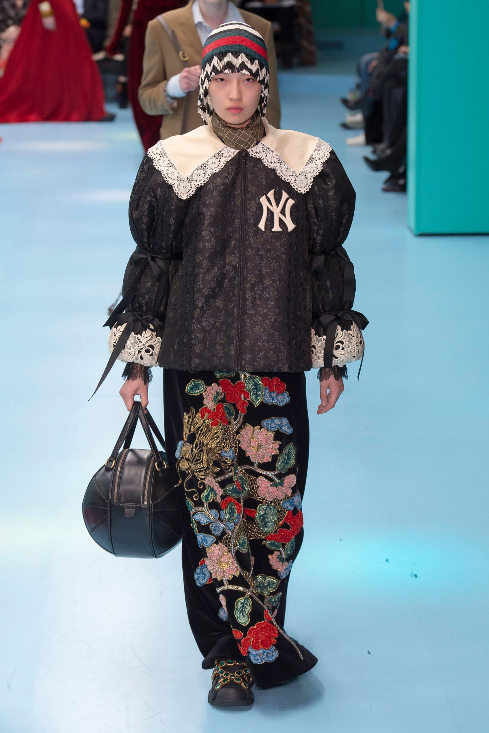 black embroidered jacket and skirt