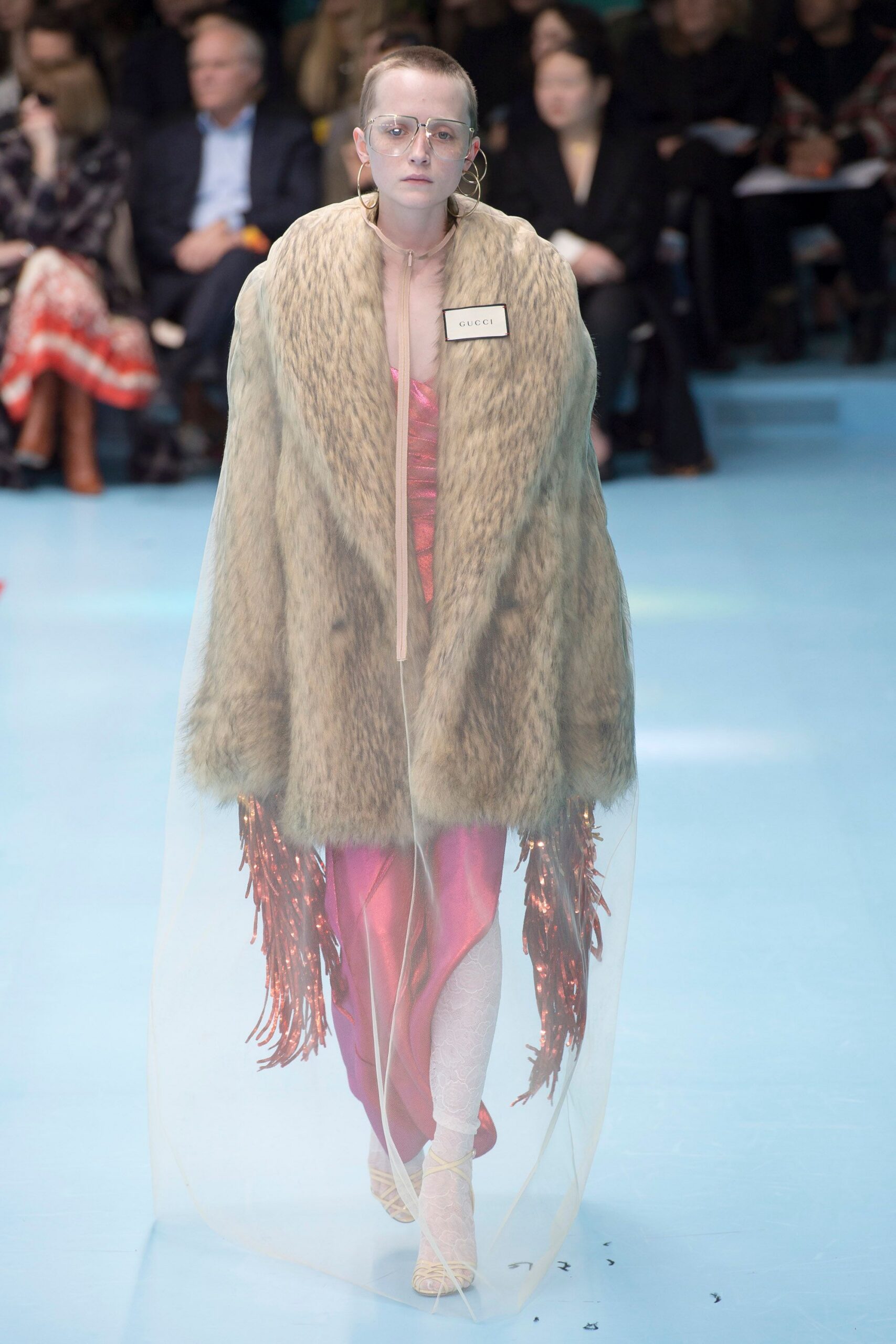 pink silk fitted gown with fur cape