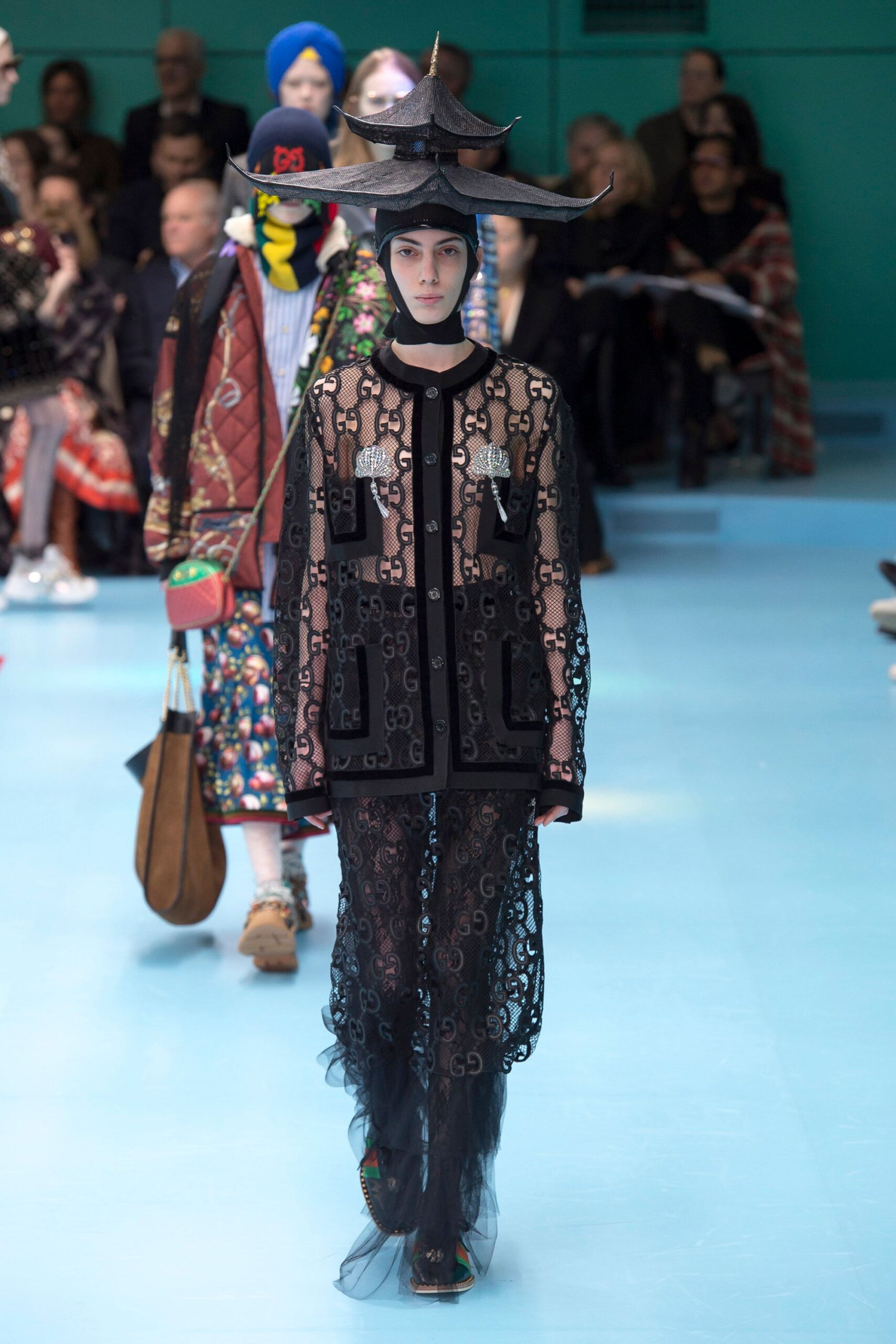 black lace coat with structured hat