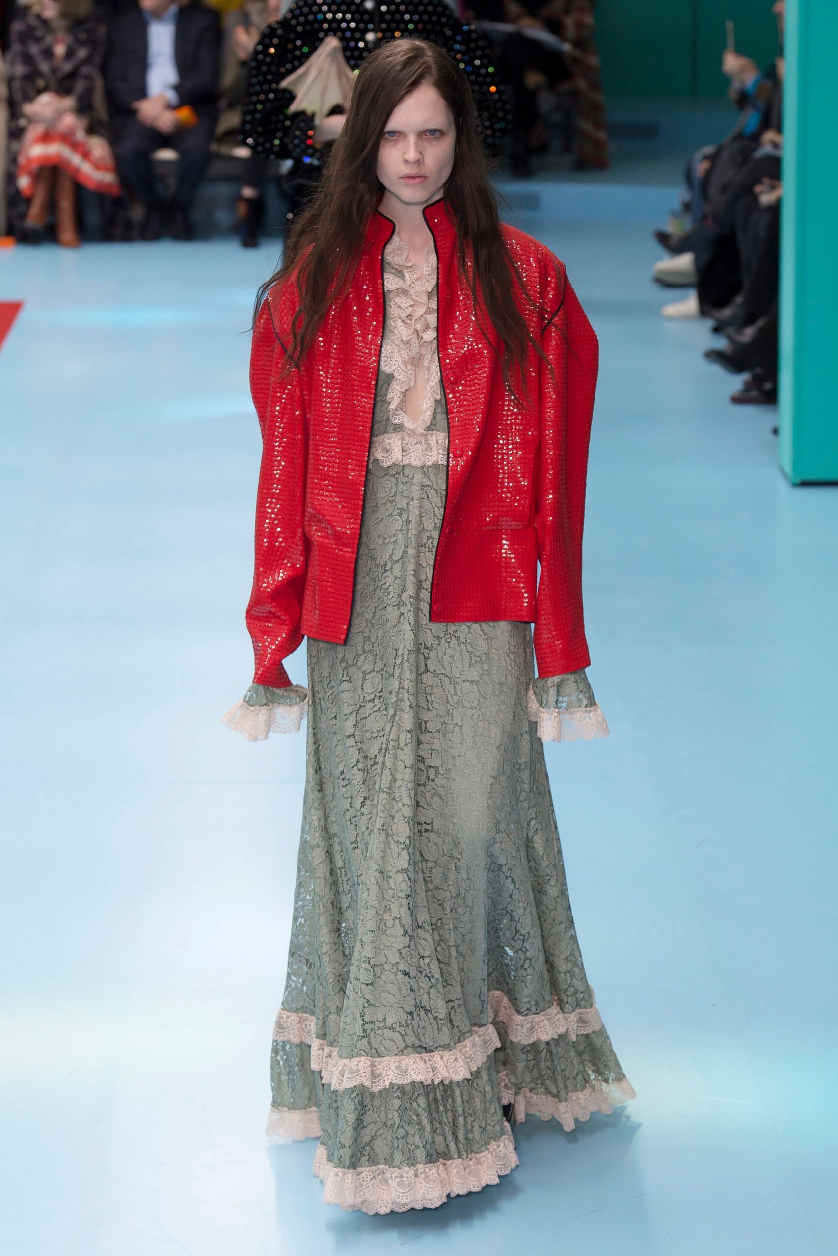 oversized red leather jacket and green lace dress