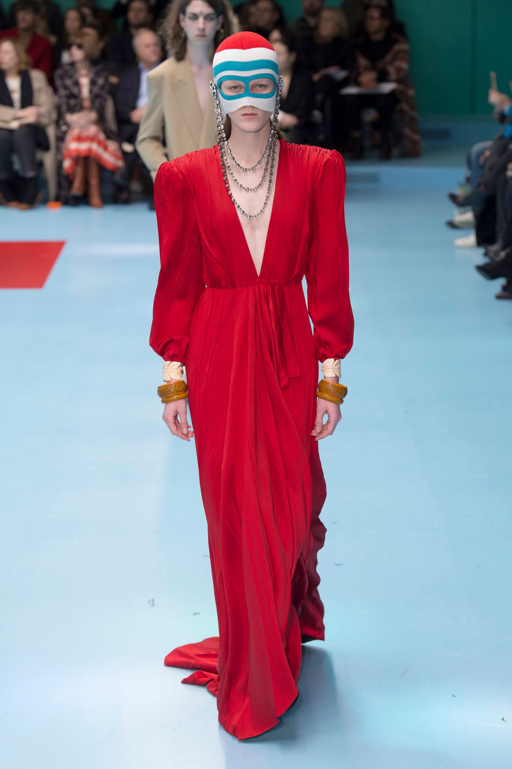 red silk long-sleeve gown