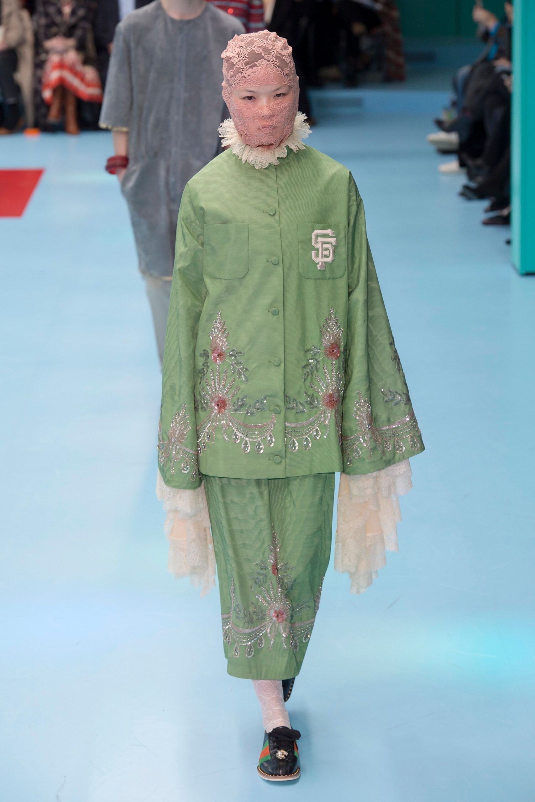 green embroidered jacket and pants