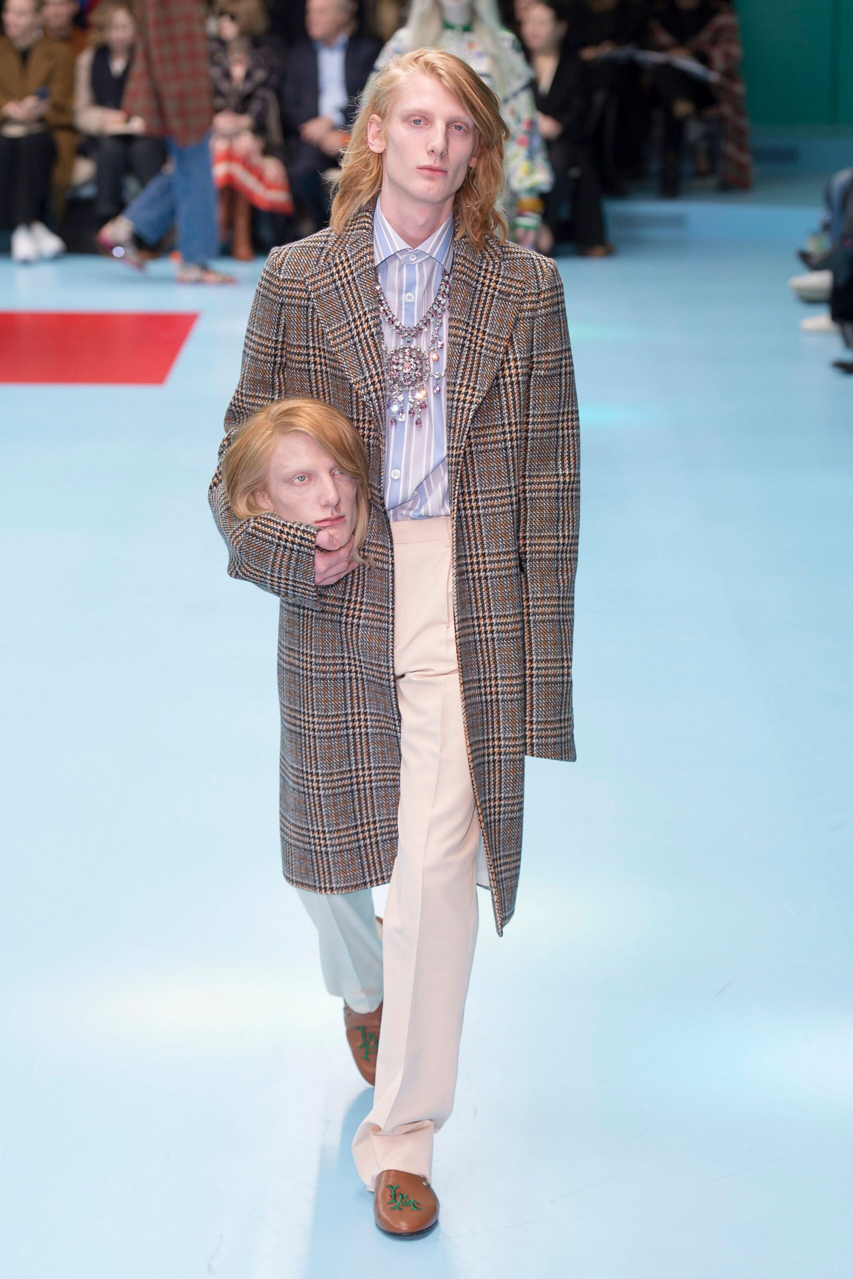 brown checked coat with blue shirt