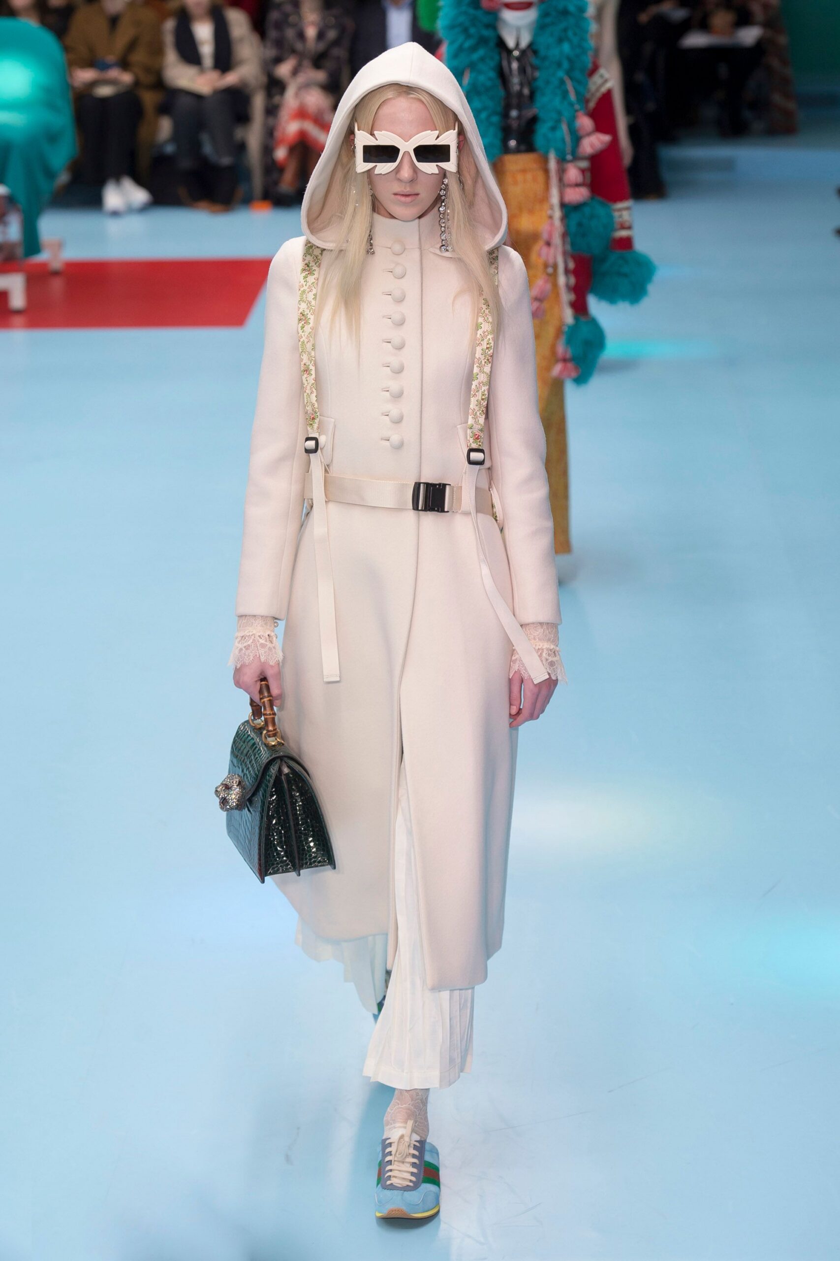 white hooded coat with sunglasses