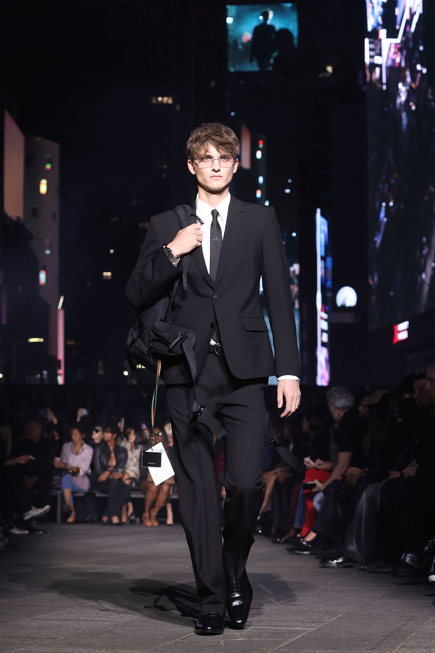 black tailored suit with white shirt