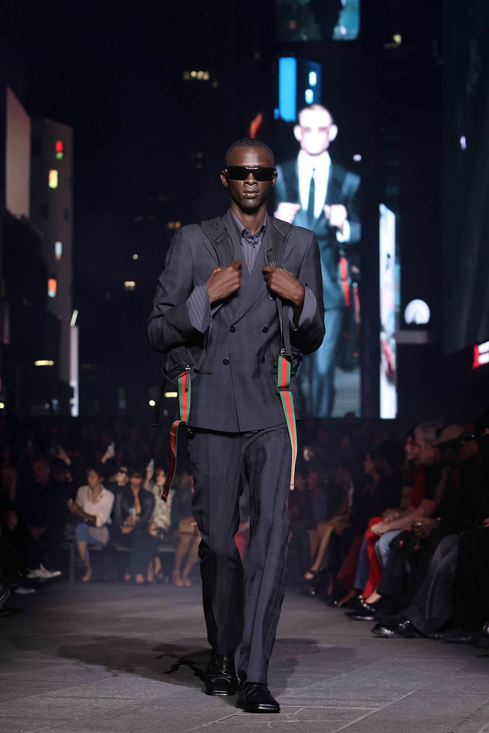gray tailored suit with blue shirt