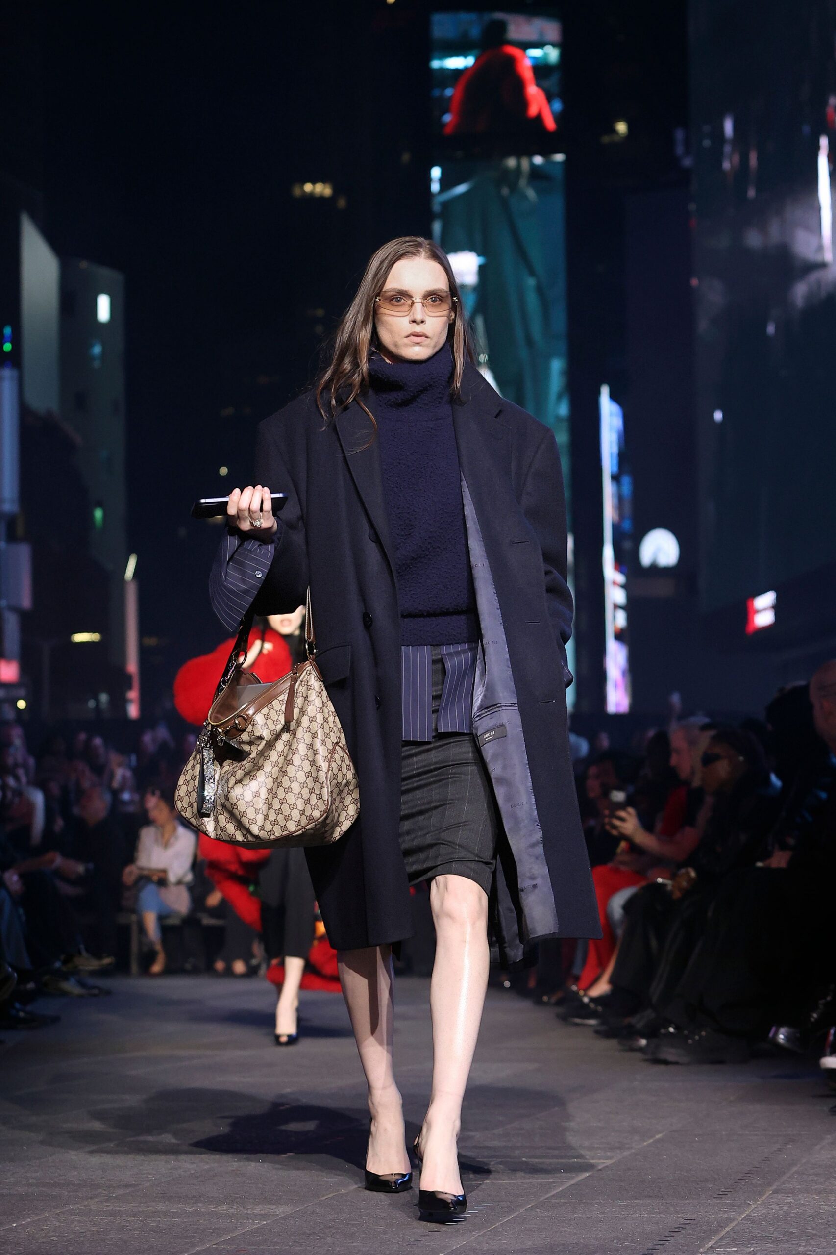 black wool coat with navy sweater