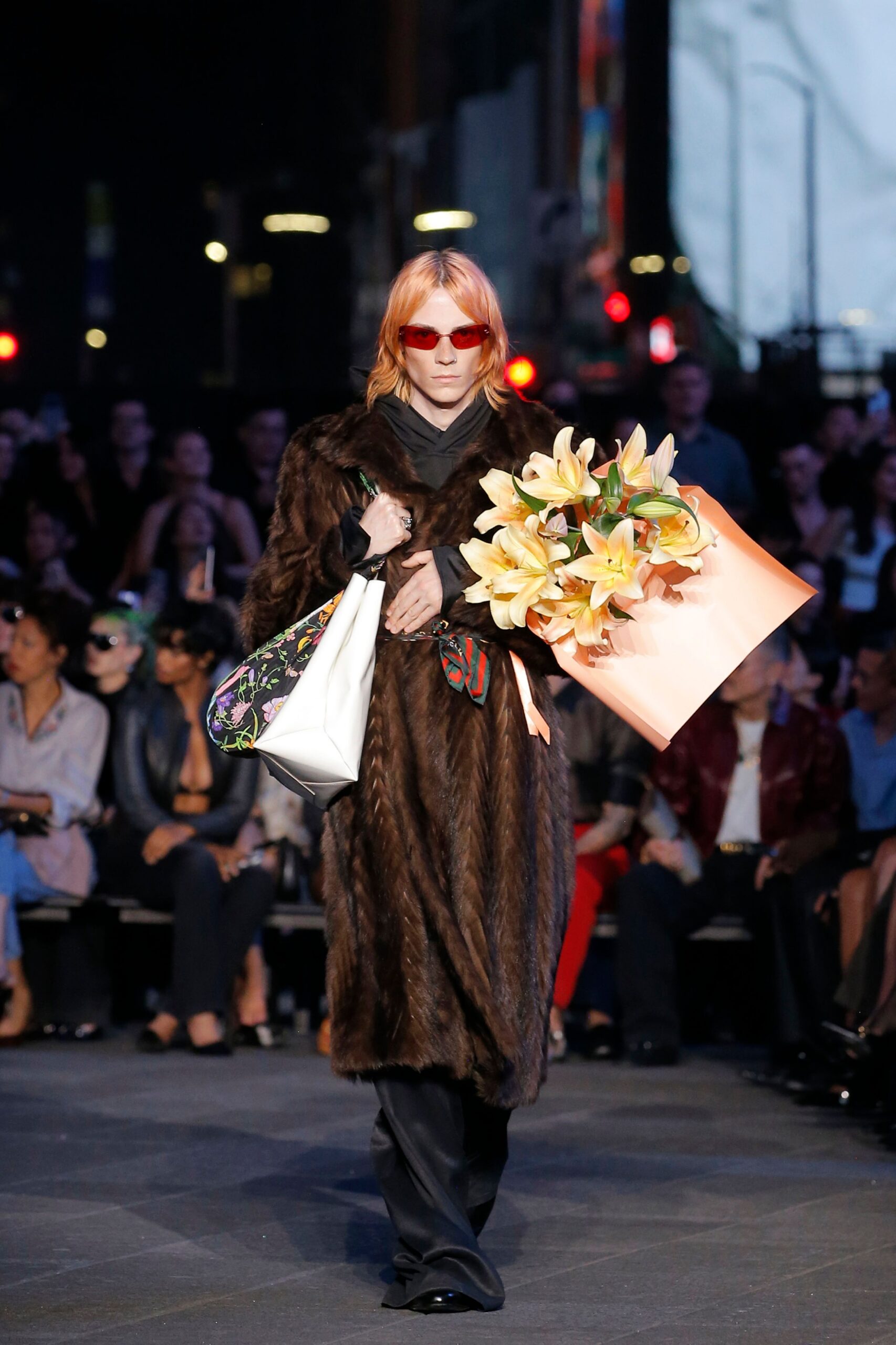 brown faux-fur coat with black pants