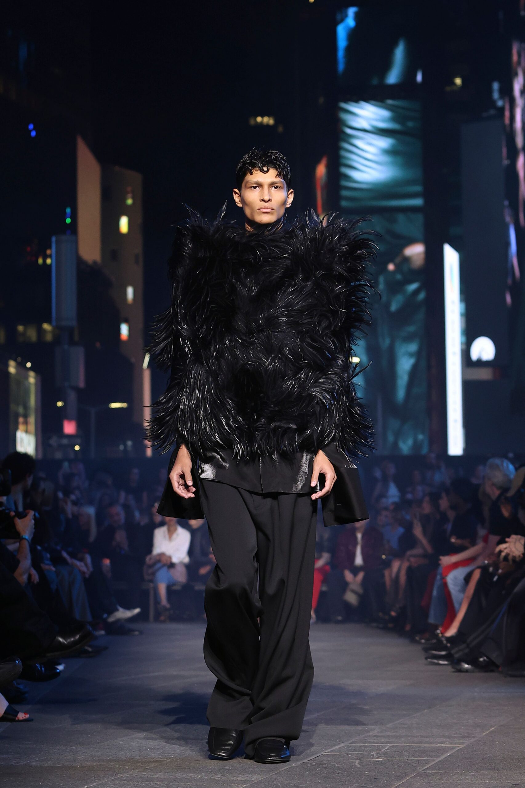 black fur coat with relaxed pants