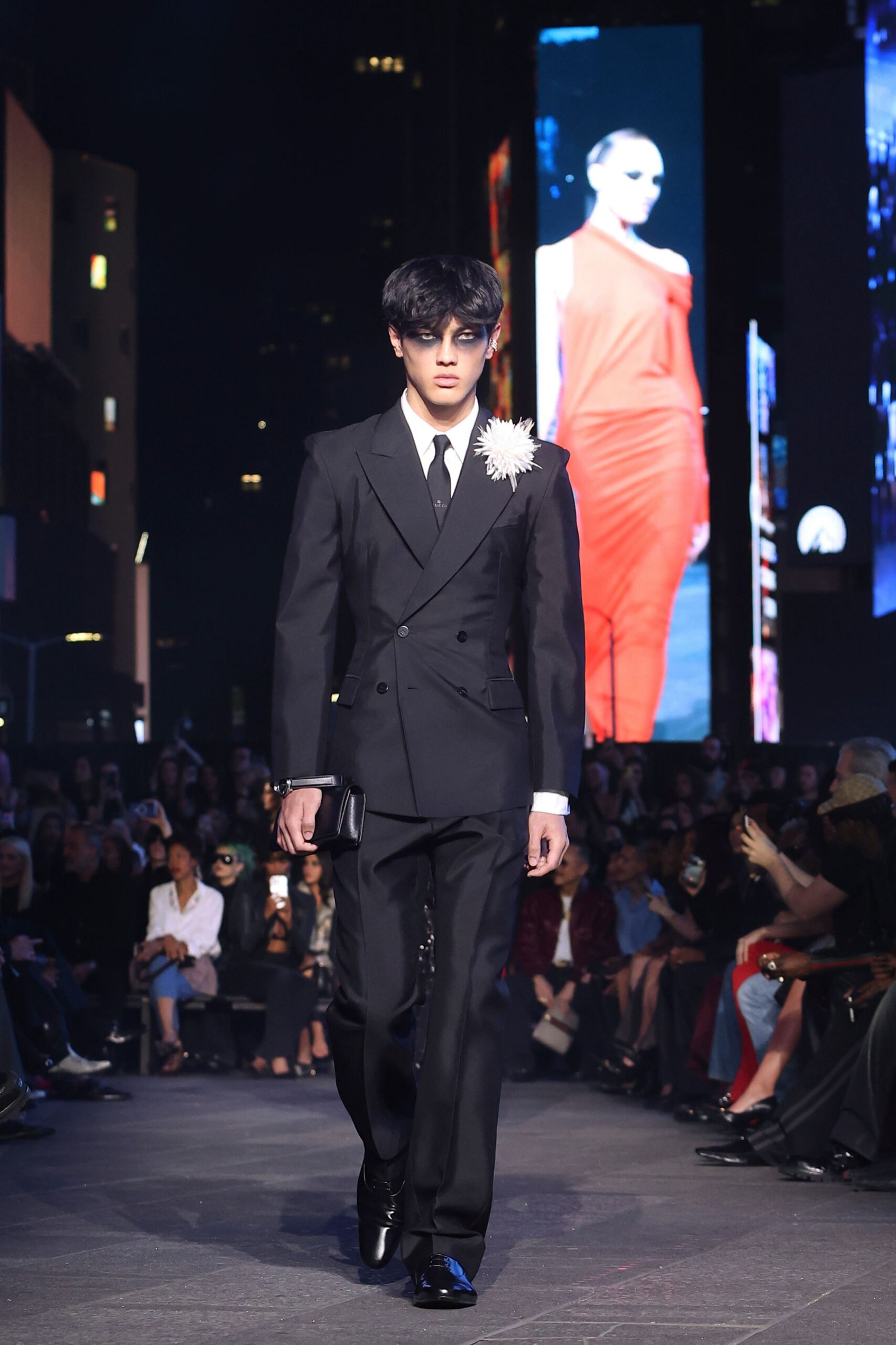 black tailored suit with bag