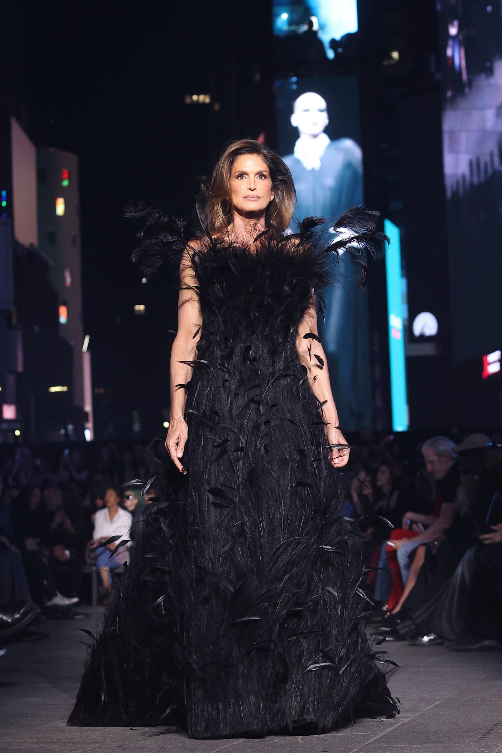 black feathered sleeveless gown
