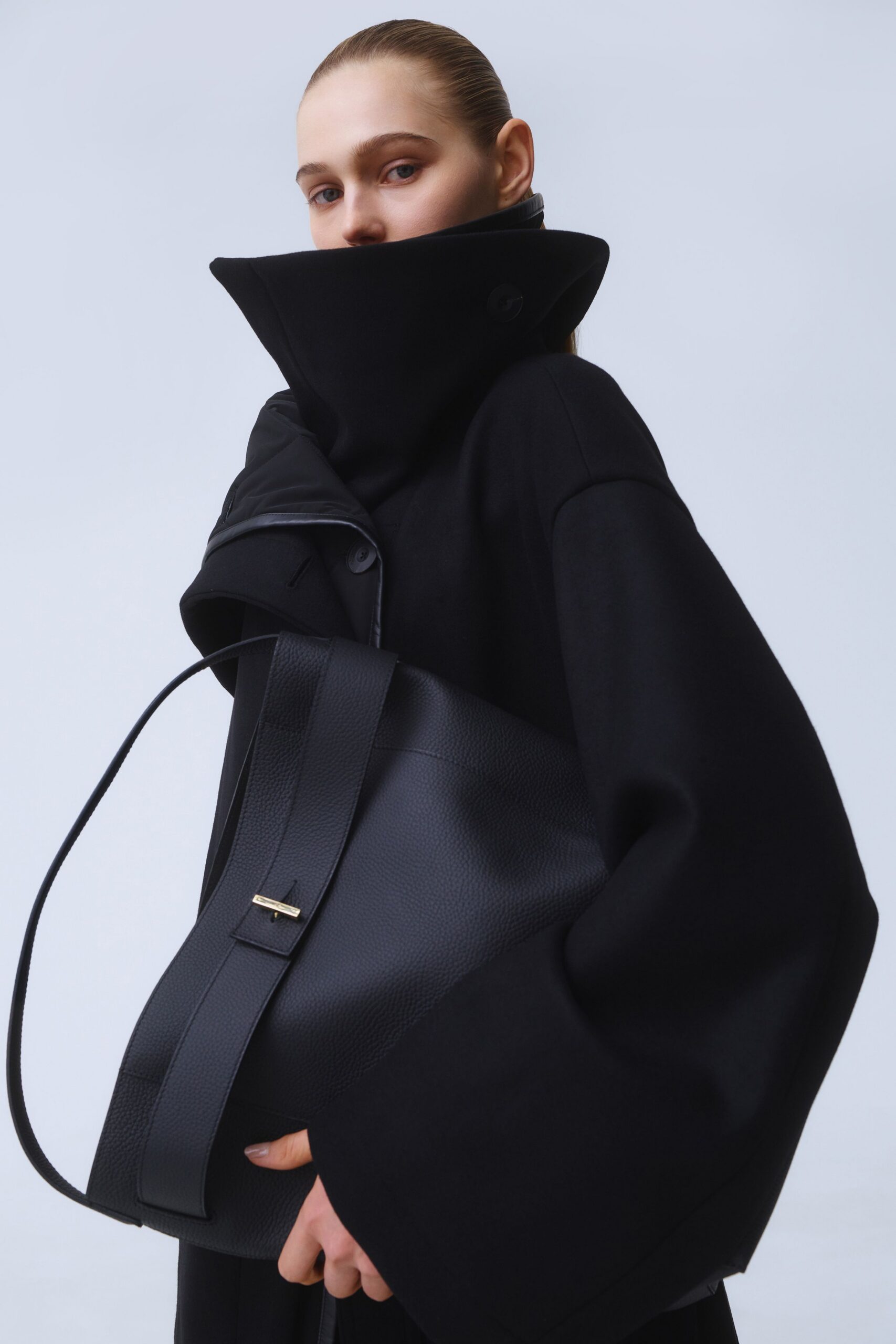 oversized black wool coat and bag