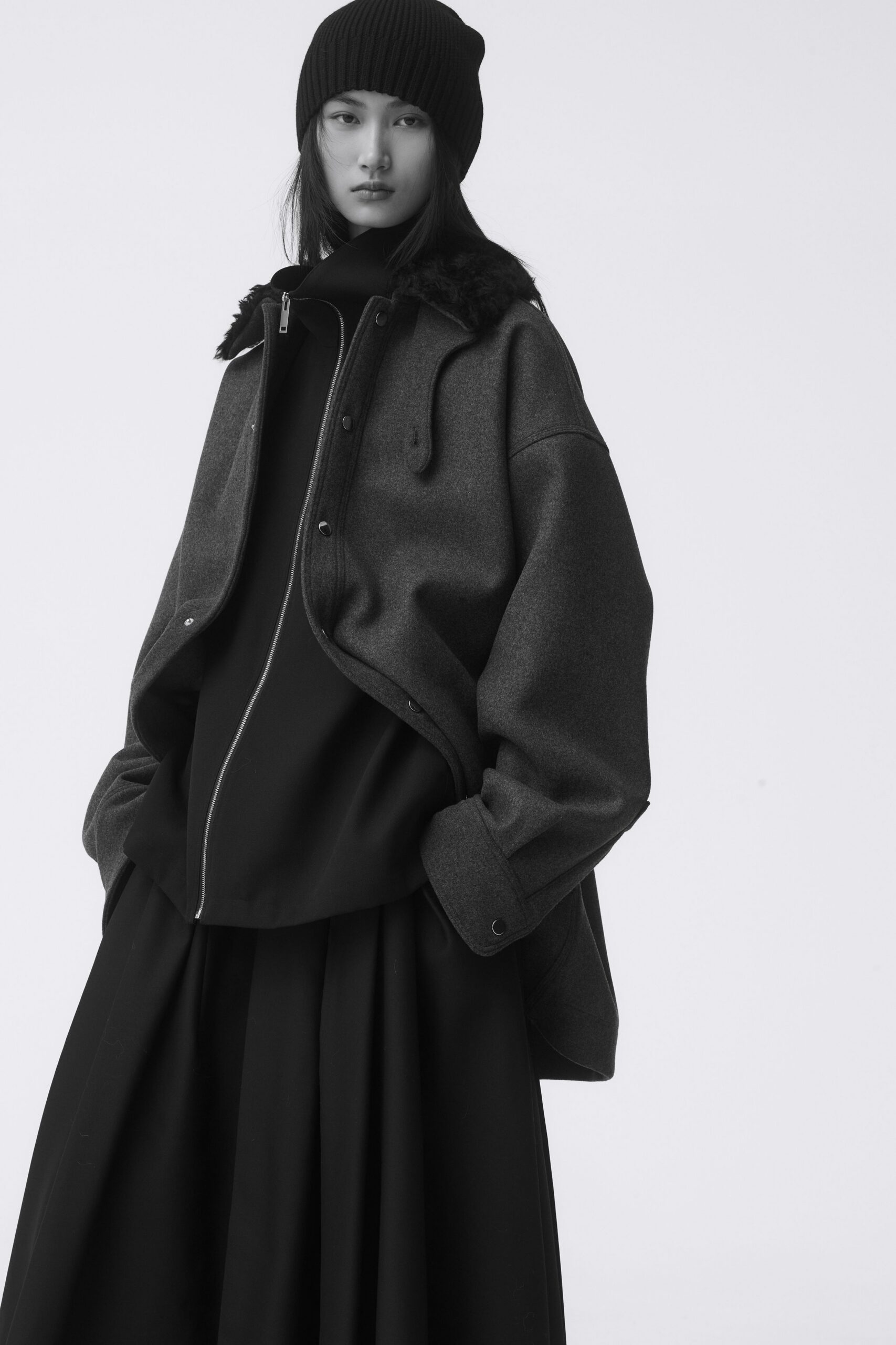 black wool long-sleeve collared oversized zippered jacket