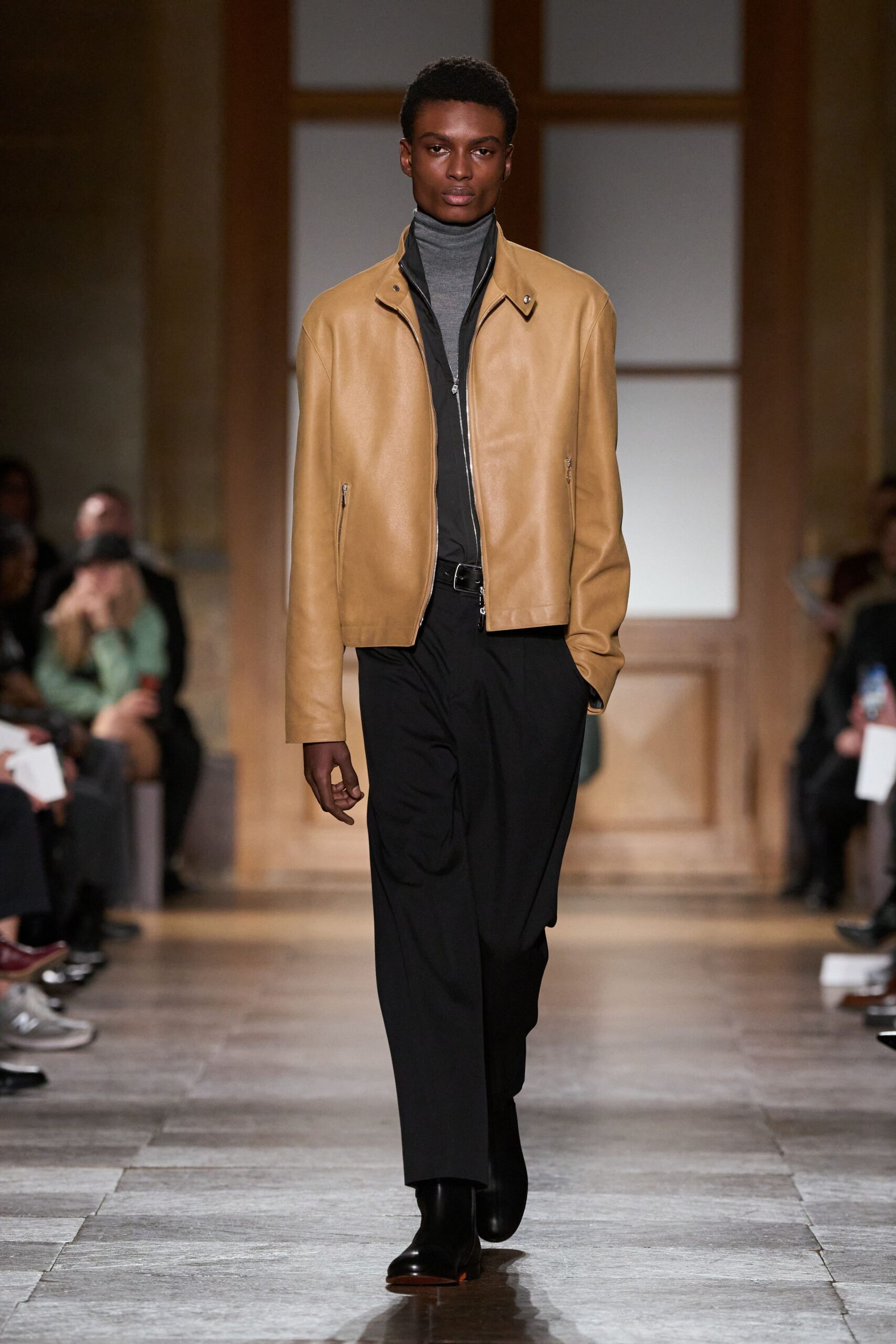 brown leather jacket with gray shirt