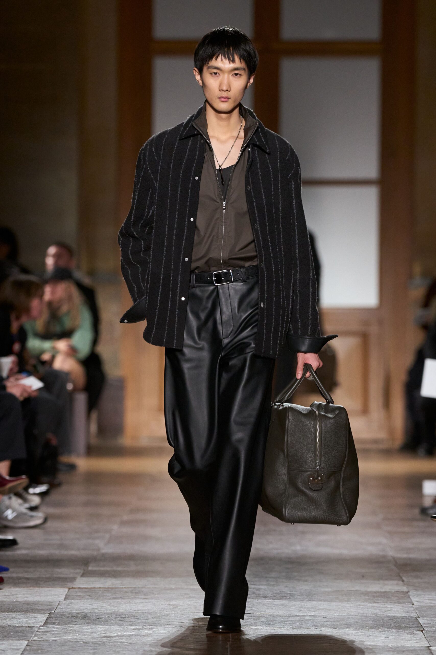 black relaxed shirt with leather pants