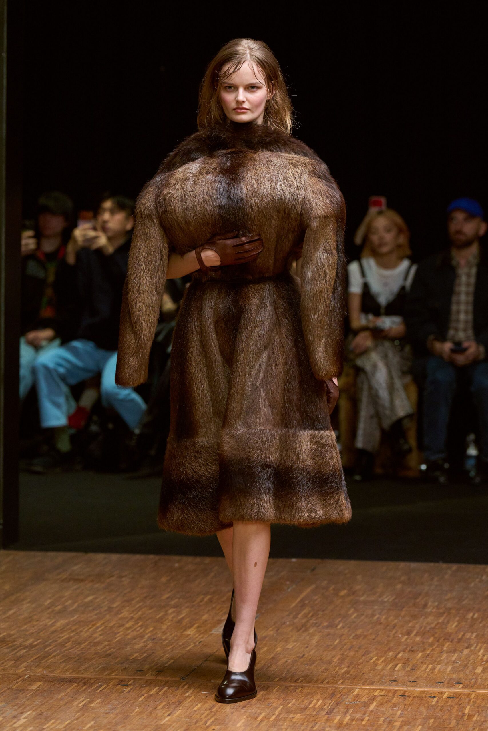 brown fur coat with black shoes