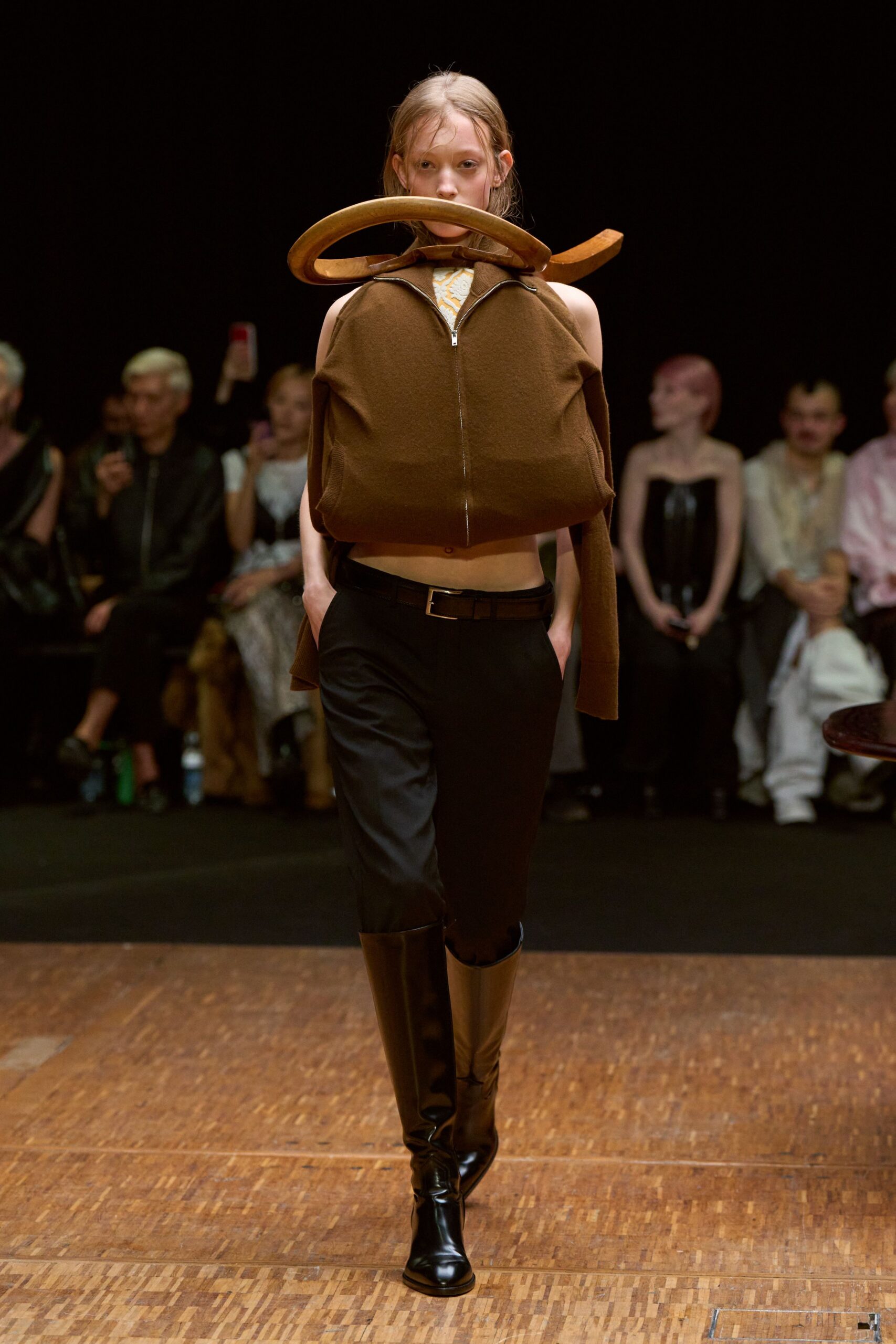 brown fitted jacket with black pants