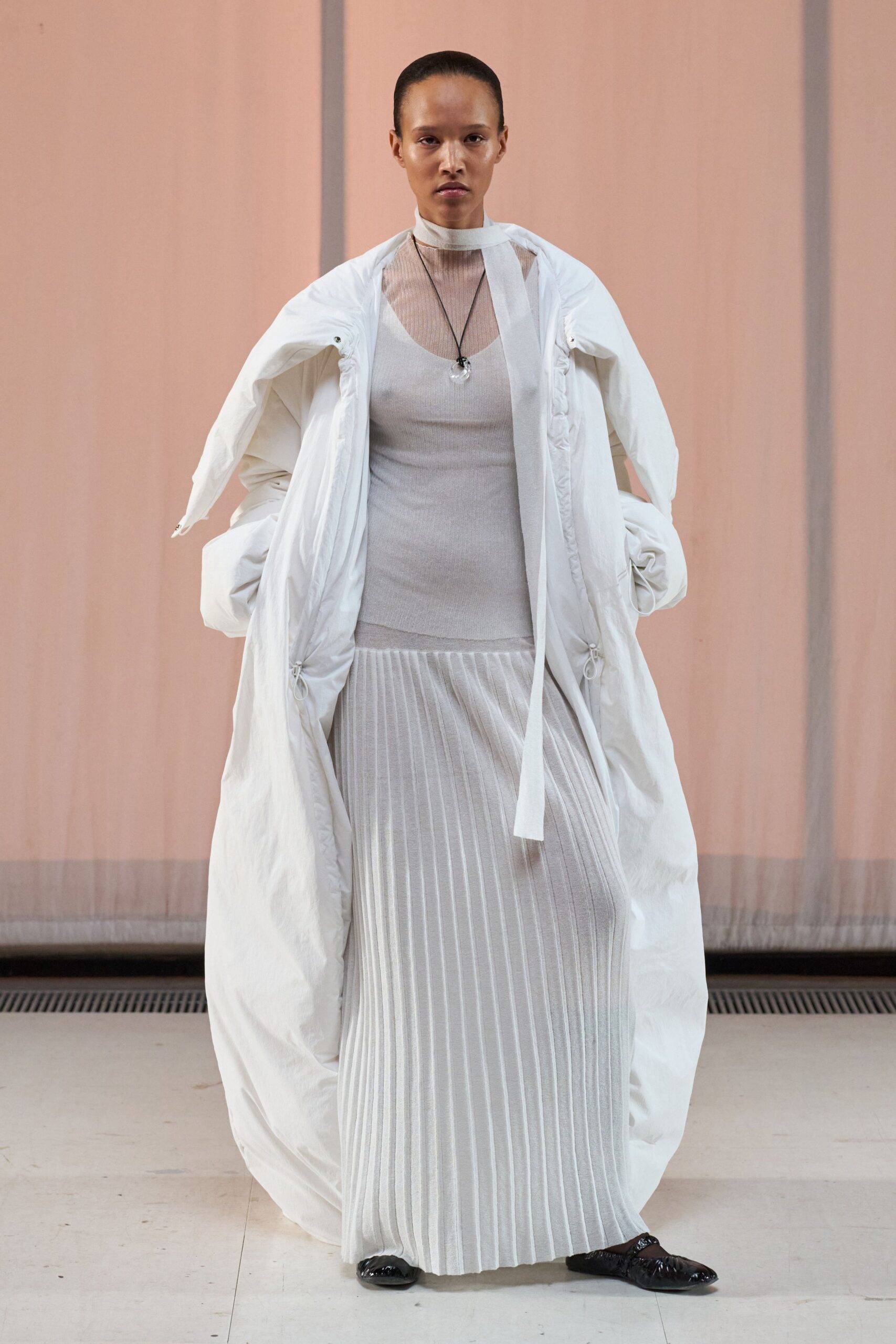 white cotton long-sleeve collared relaxed zippered maxi coat