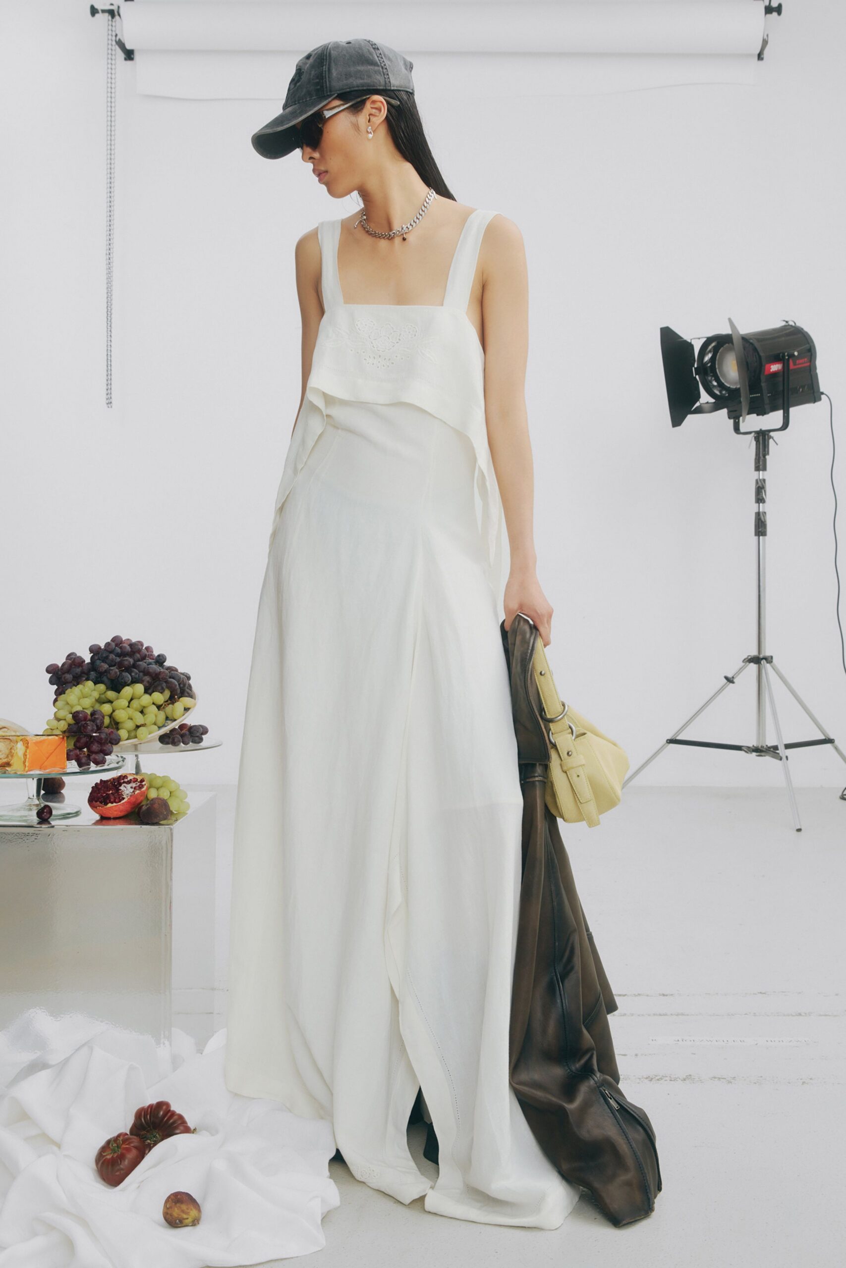 white maxi dress with black coat