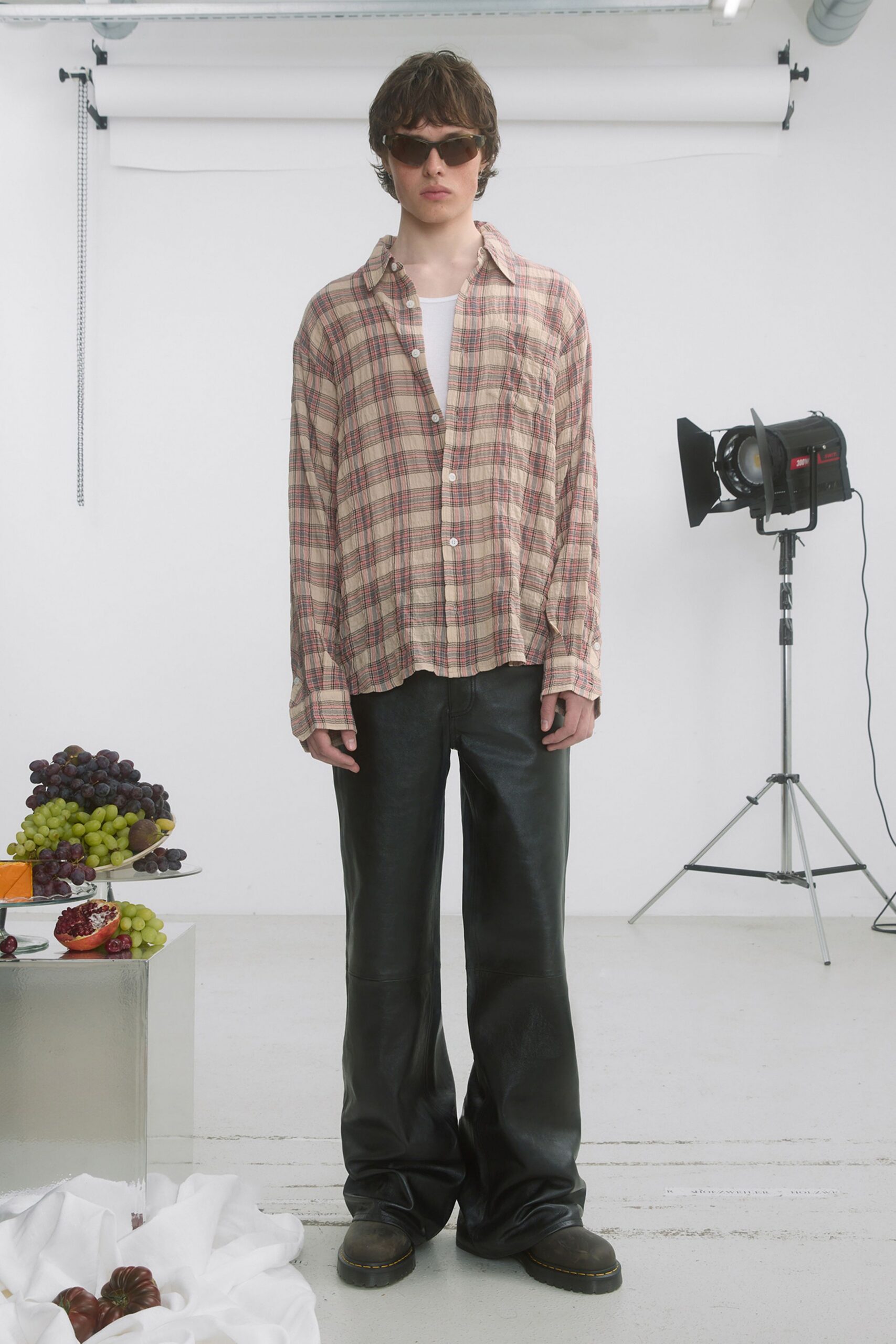 beige checked shirt with black pants