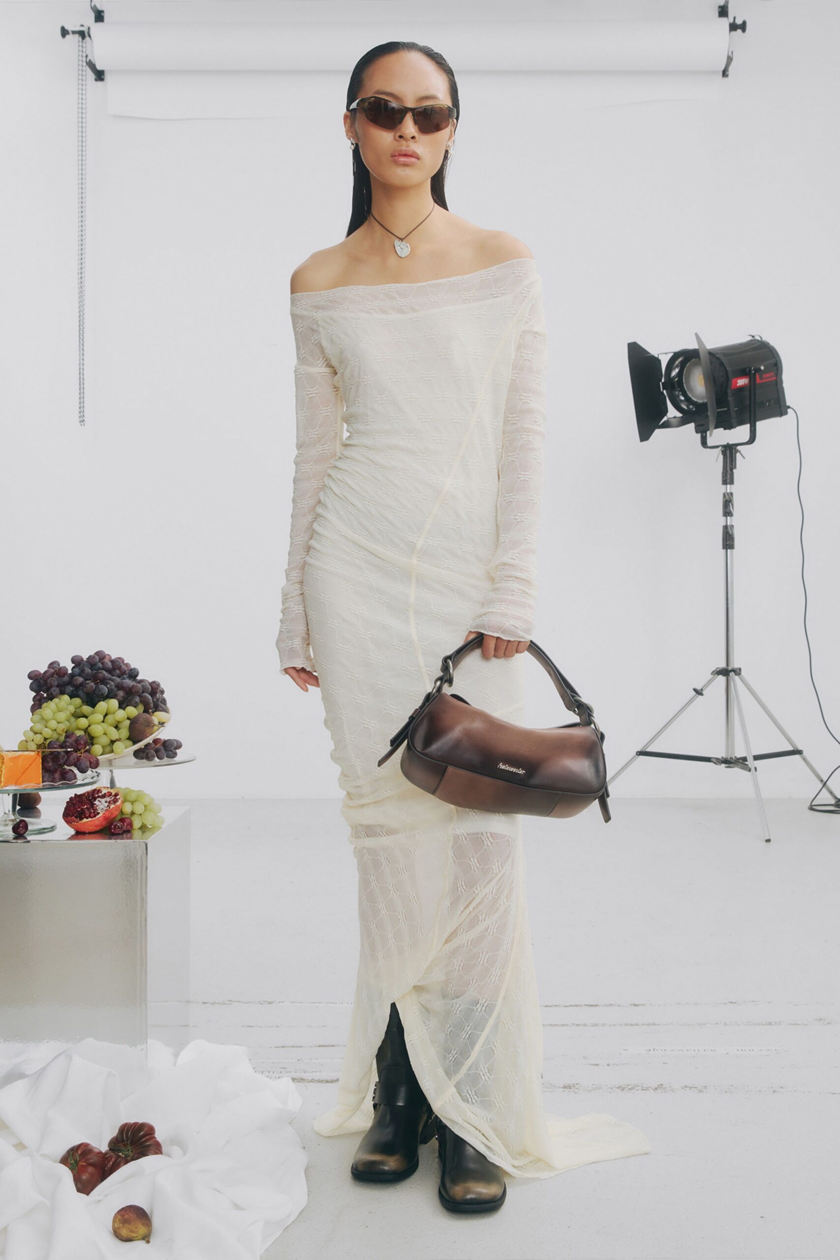 white chiffon long-sleeve off-shoulder fitted ruched sheer gown