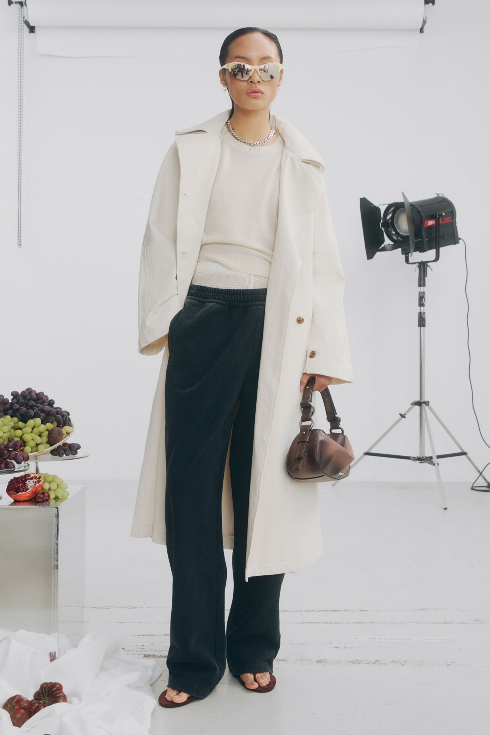 white cotton long-sleeve collared relaxed buttoned coat