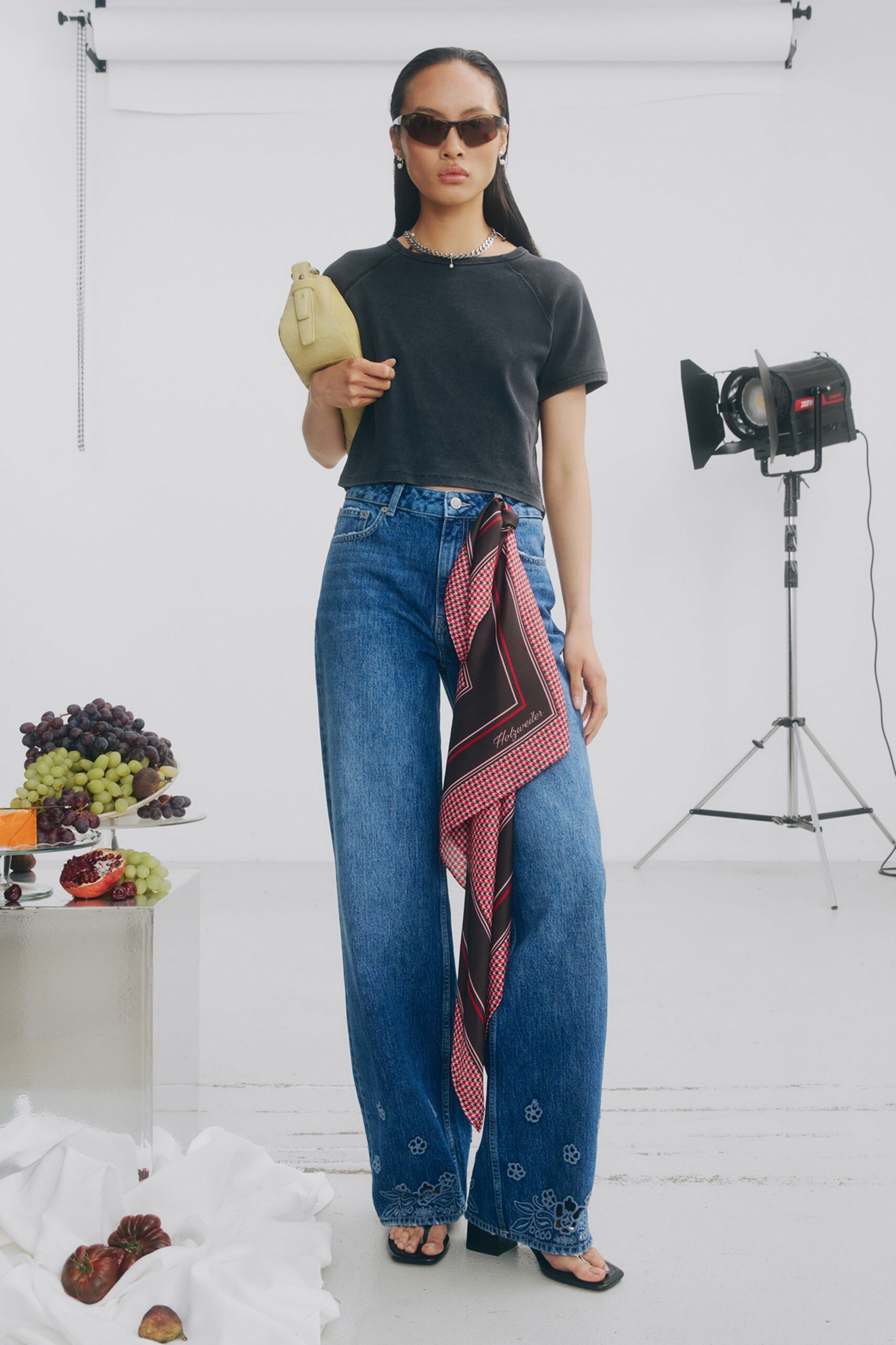 black fitted top with relaxed jeans