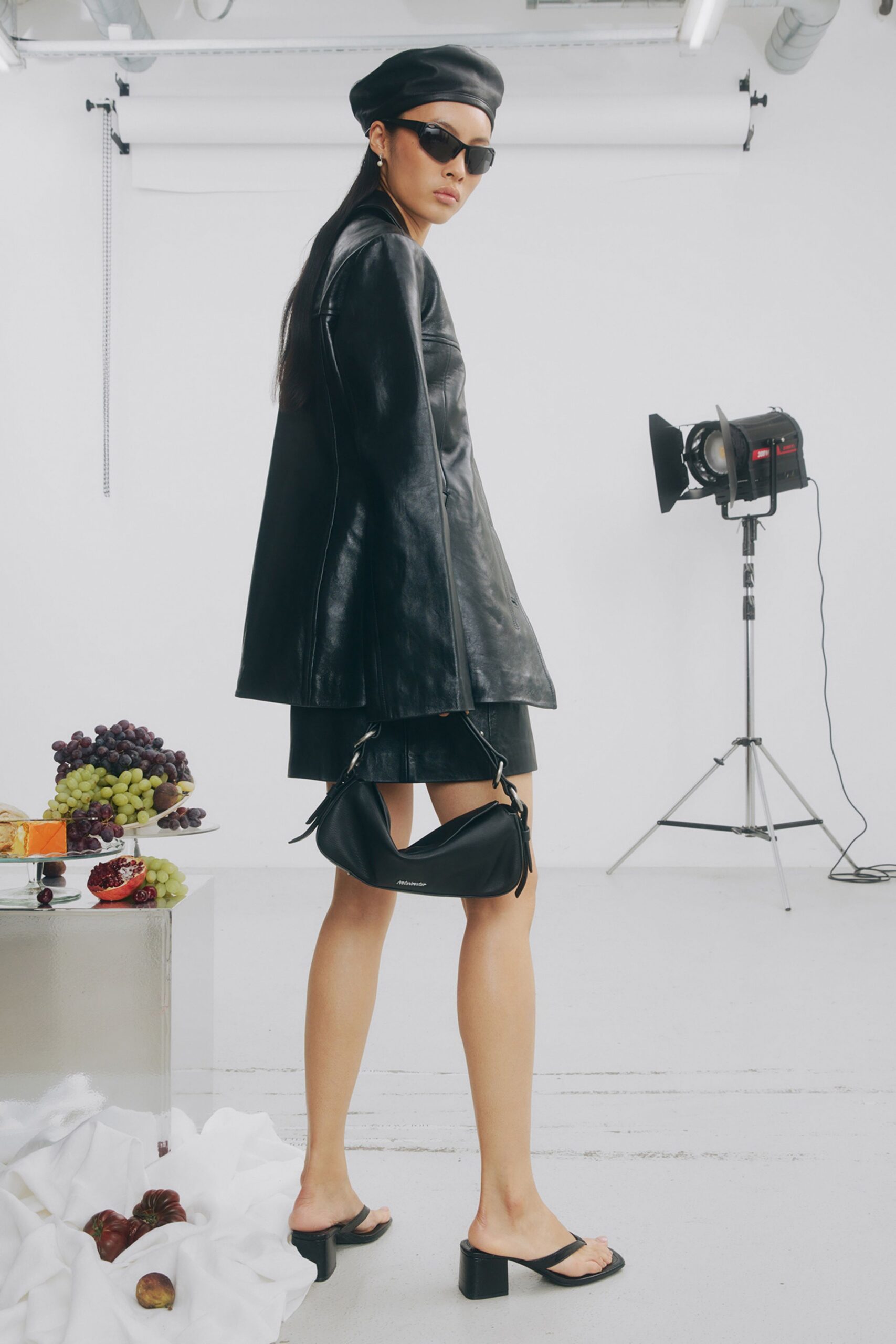 black leather long-sleeve collared fitted jacket