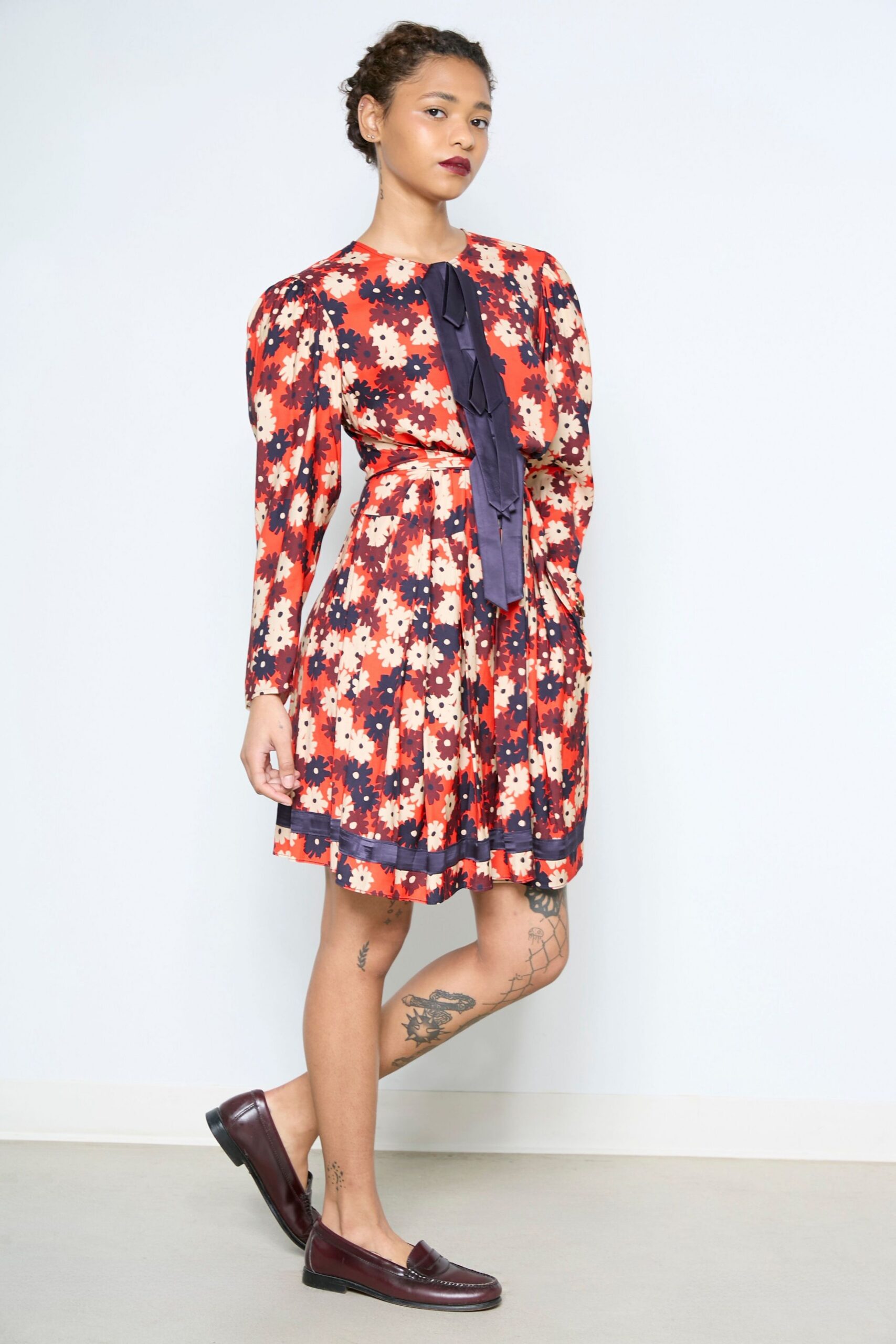 red silk long-sleeve collared fitted pleated flared dress