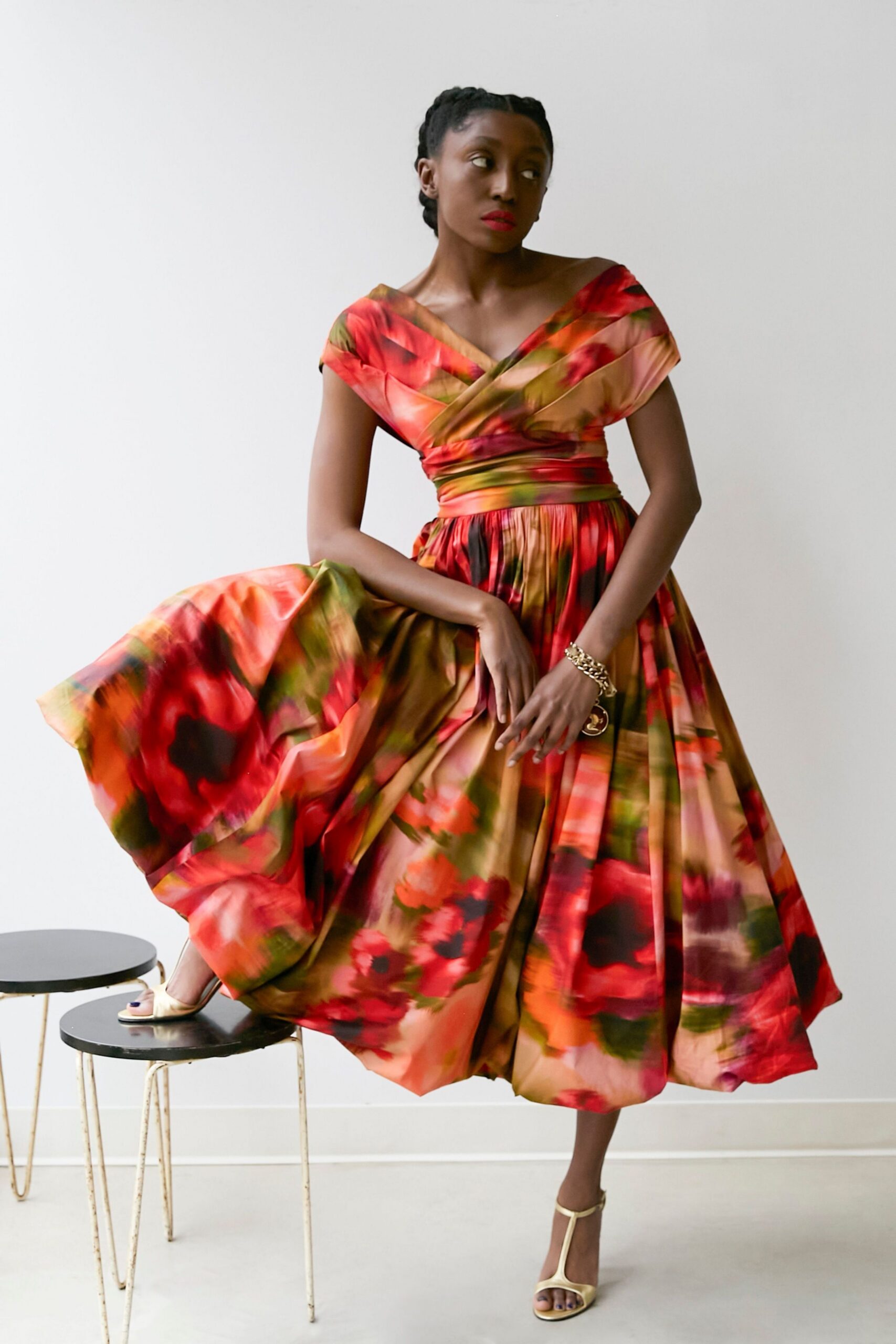 red silk short-sleeve v-neck fitted pleated flared dress