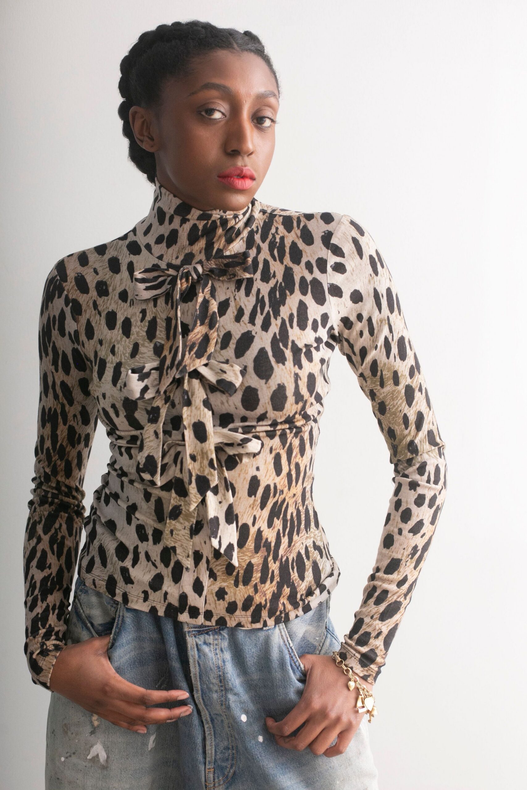 brown jersey long-sleeve turtleneck fitted animal-print ruched top