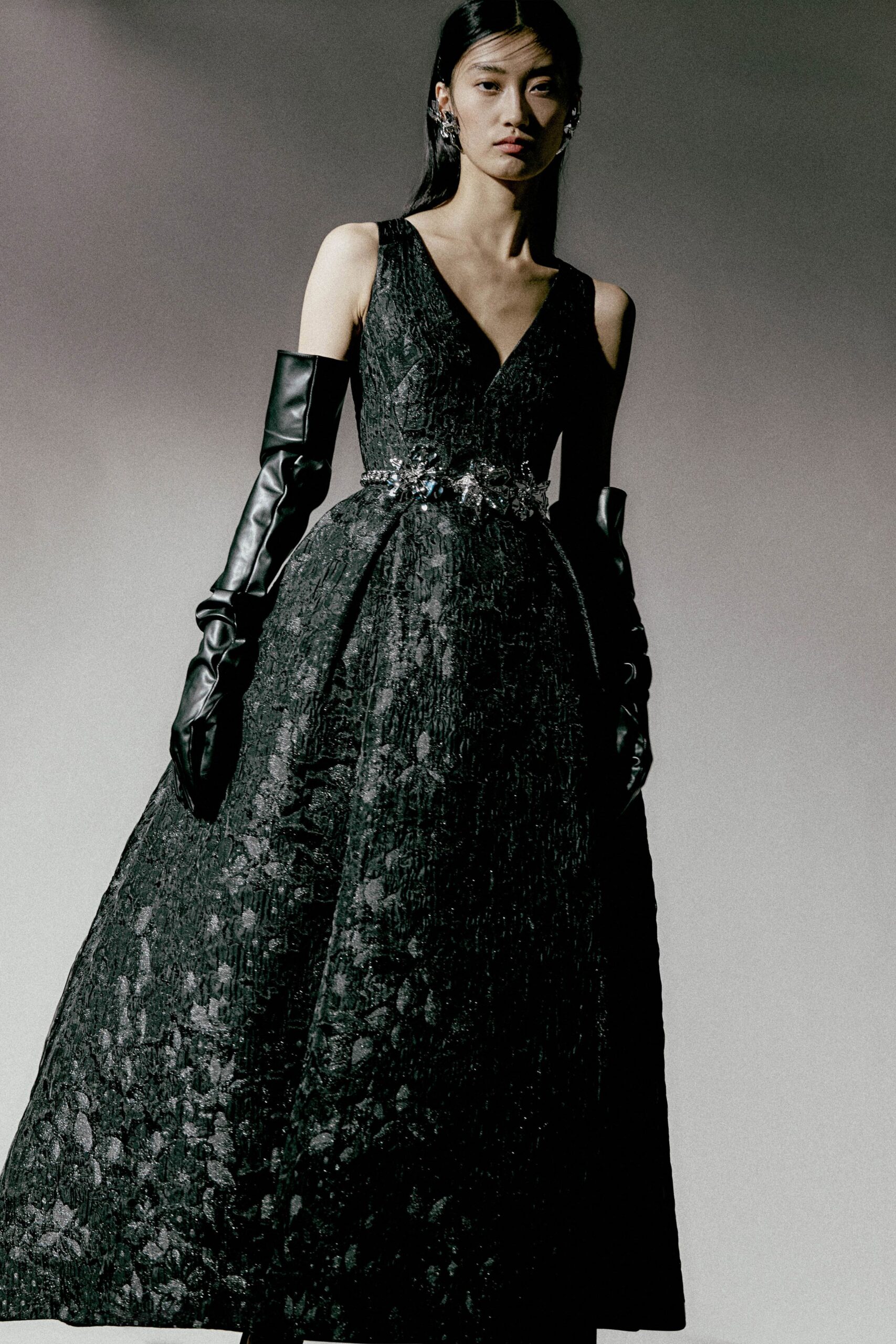 black silk sleeveless v-neck fitted pleated maxi gown
