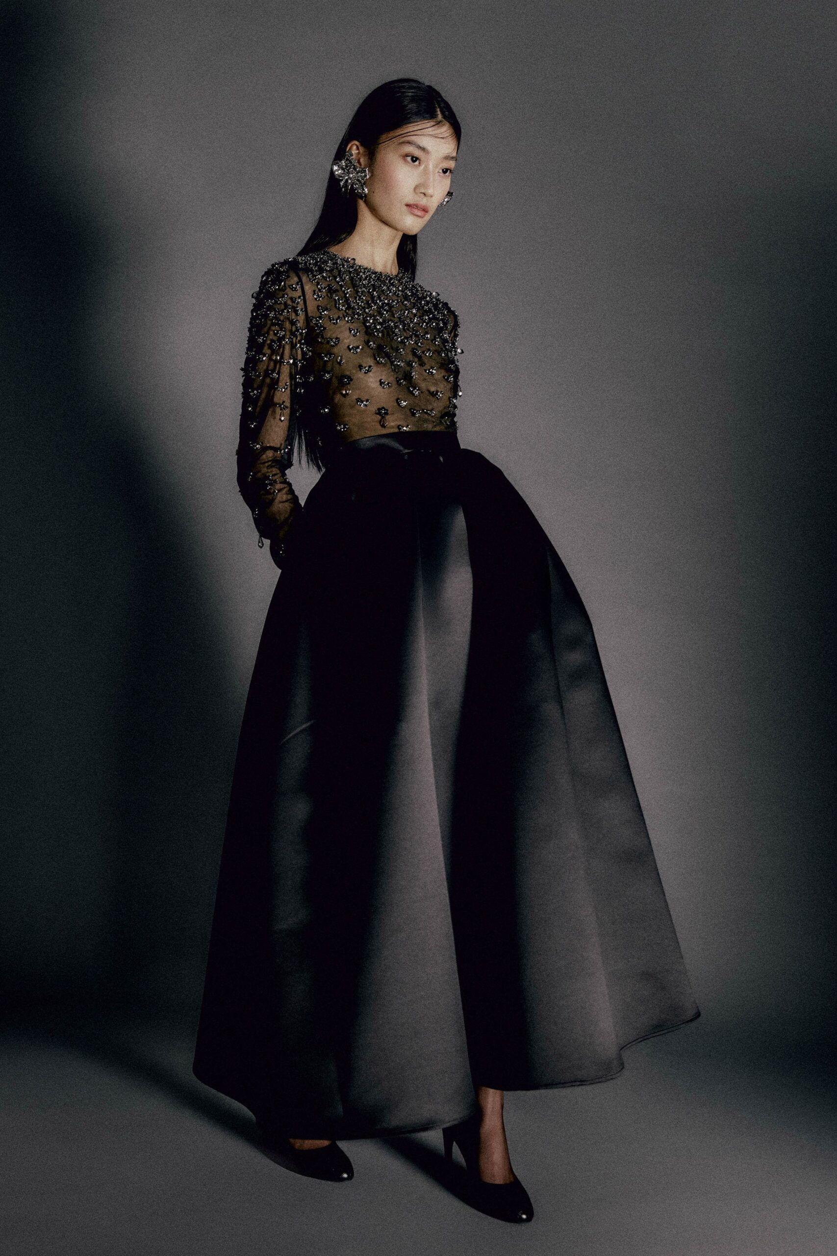 black silk long-sleeve v-neck fitted embellished tiered gown