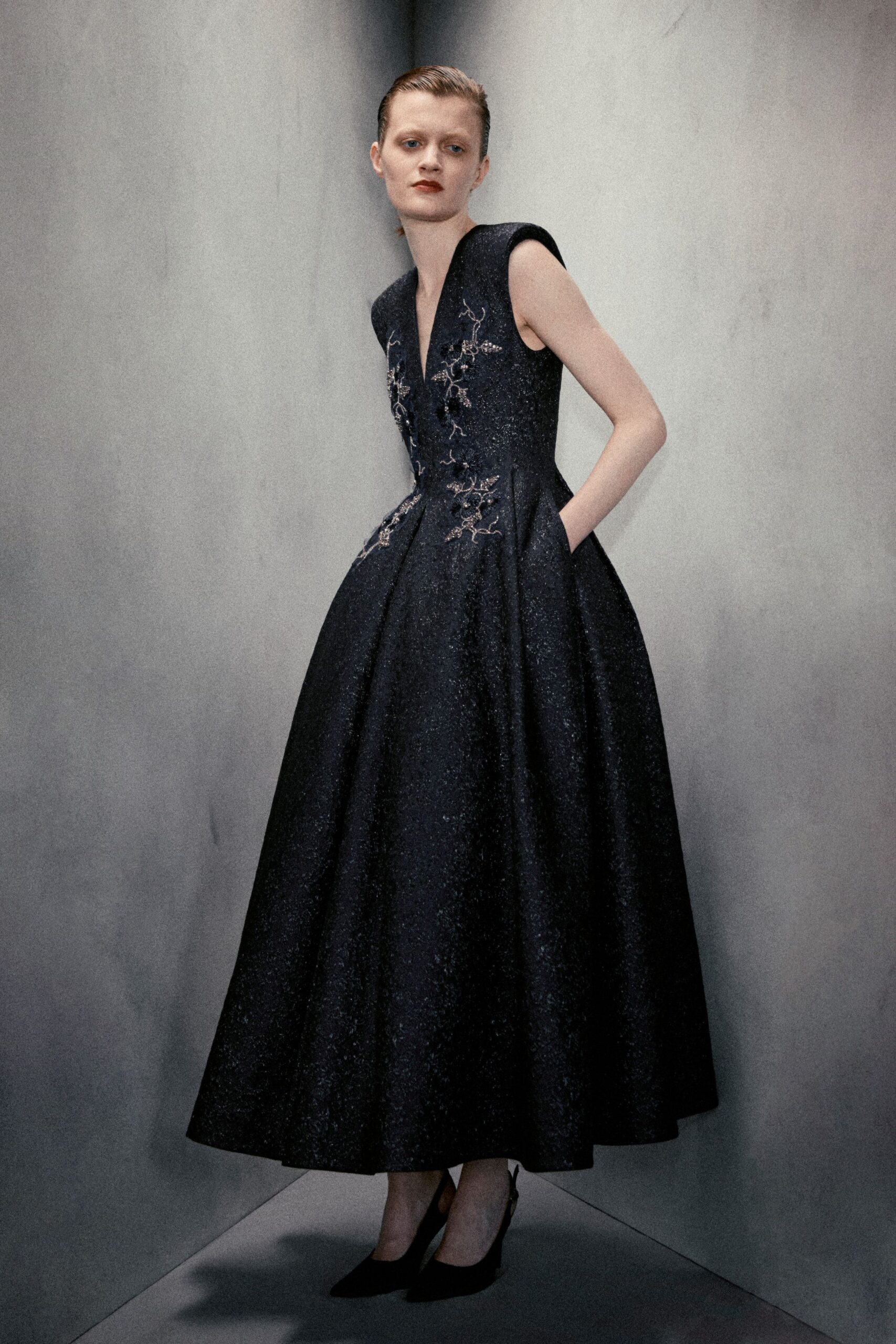 black silk sleeveless v-neck fitted embroidered a-line gown