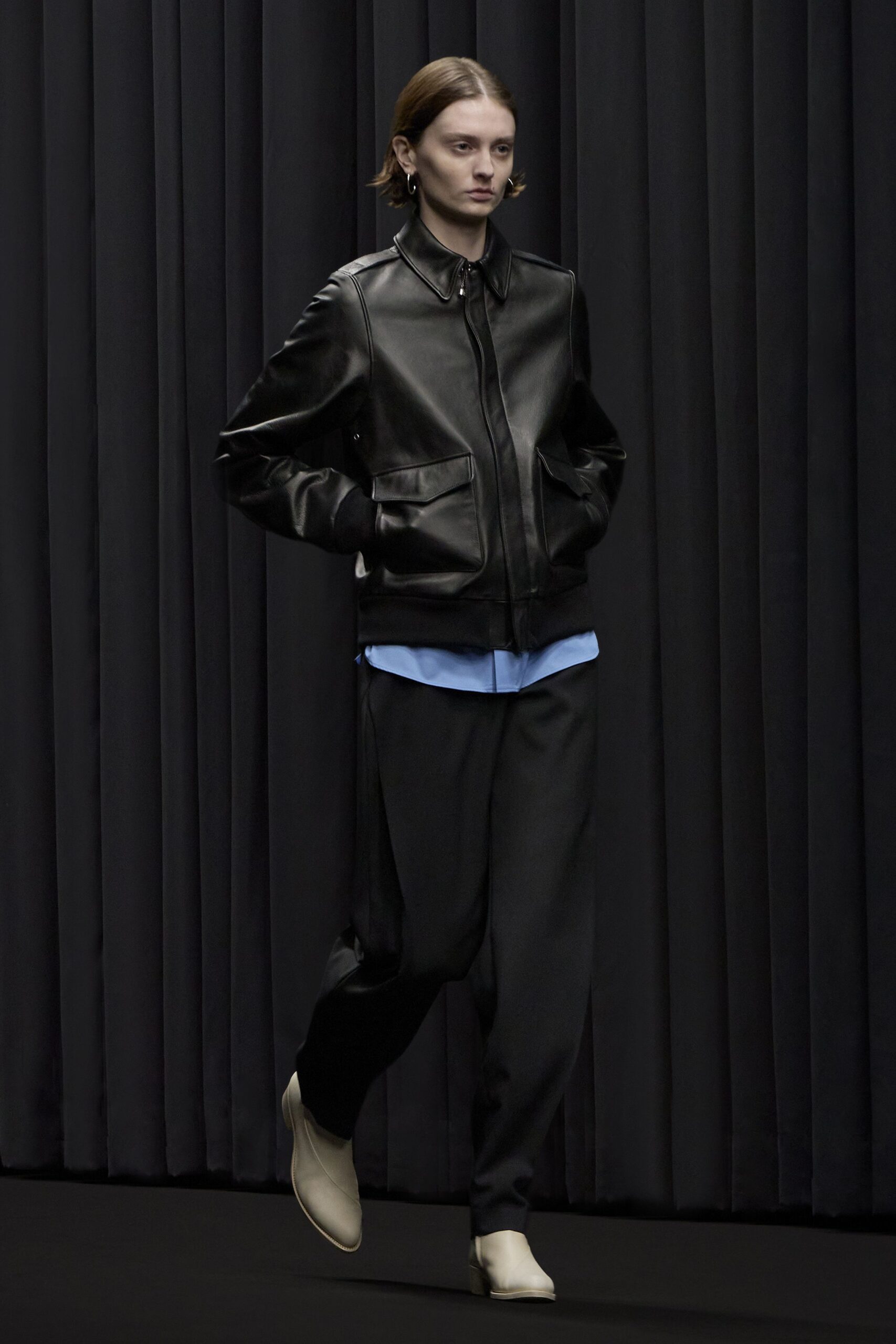 black leather jacket with blue shirt