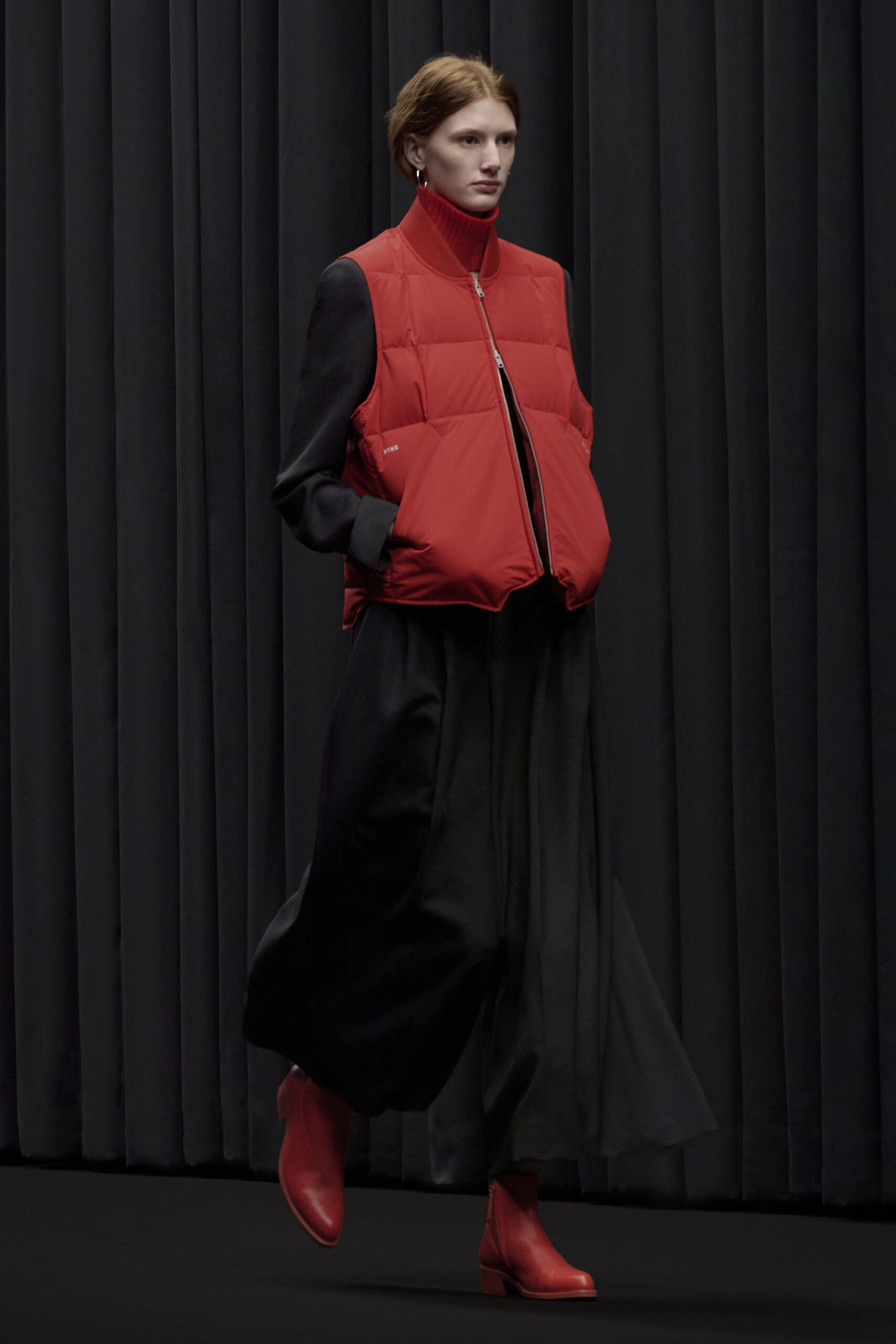 red jersey sleeveless high-neck relaxed padded vest