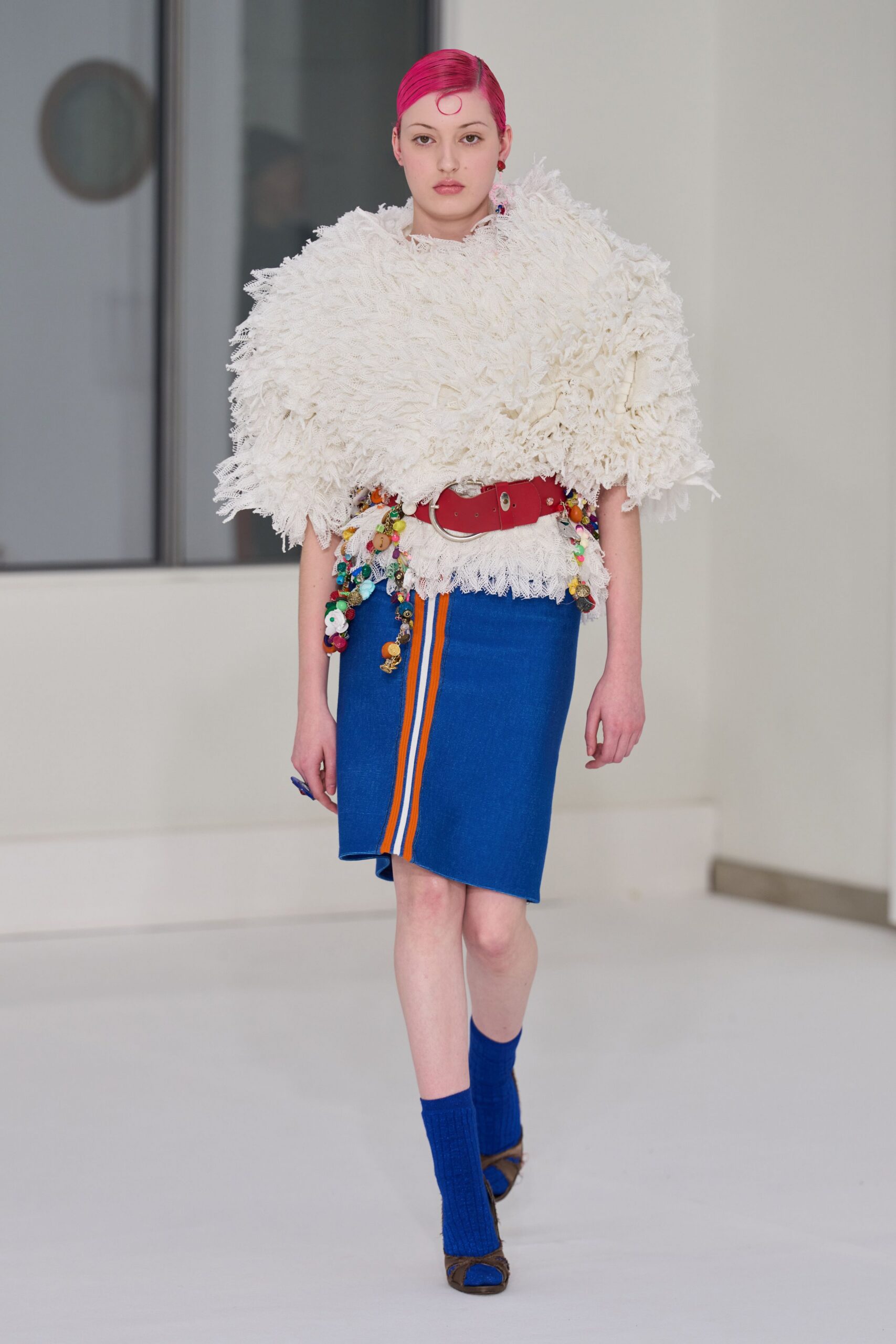 white wool sleeveless oversized fringed top